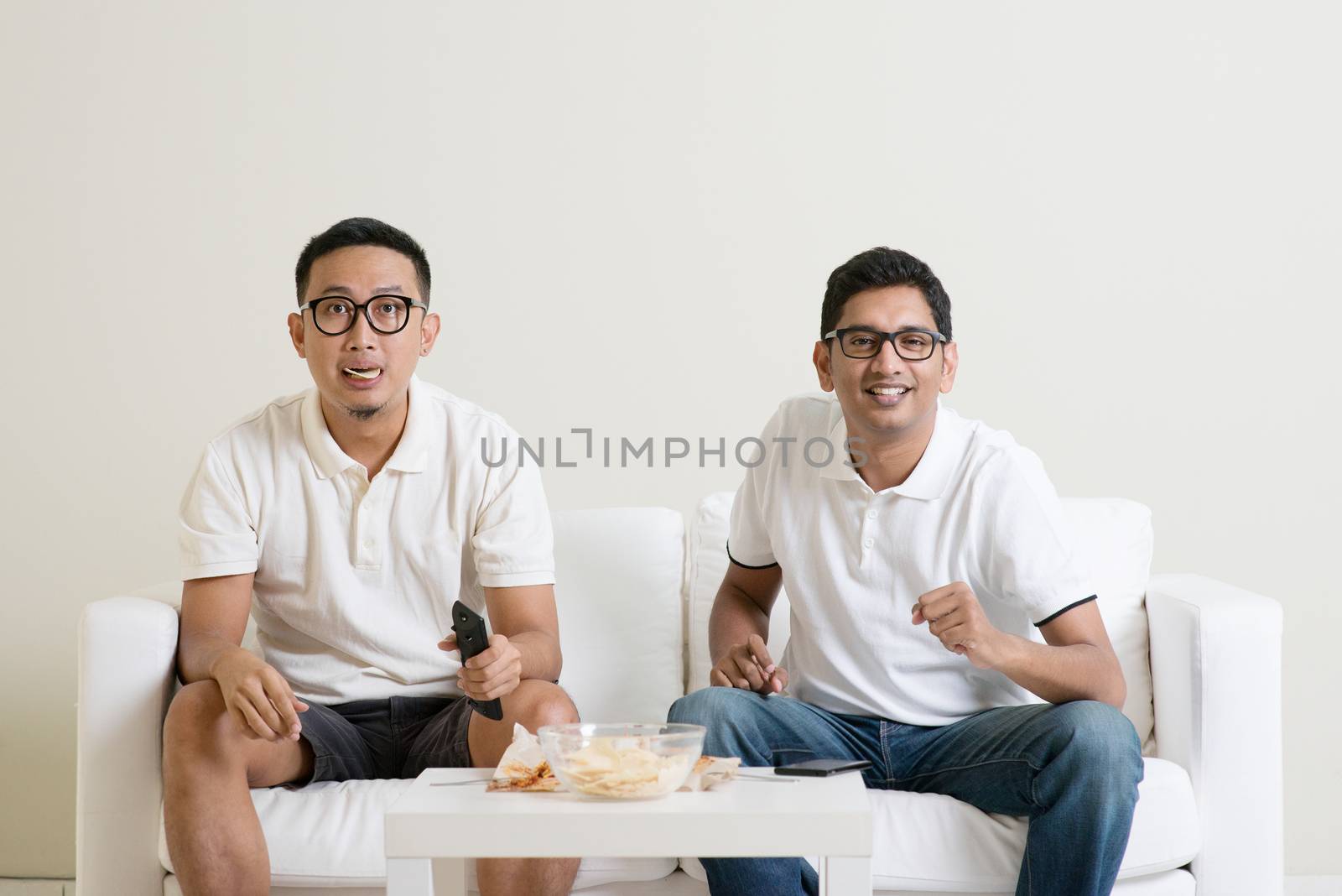 Men watching football game on tv together by szefei