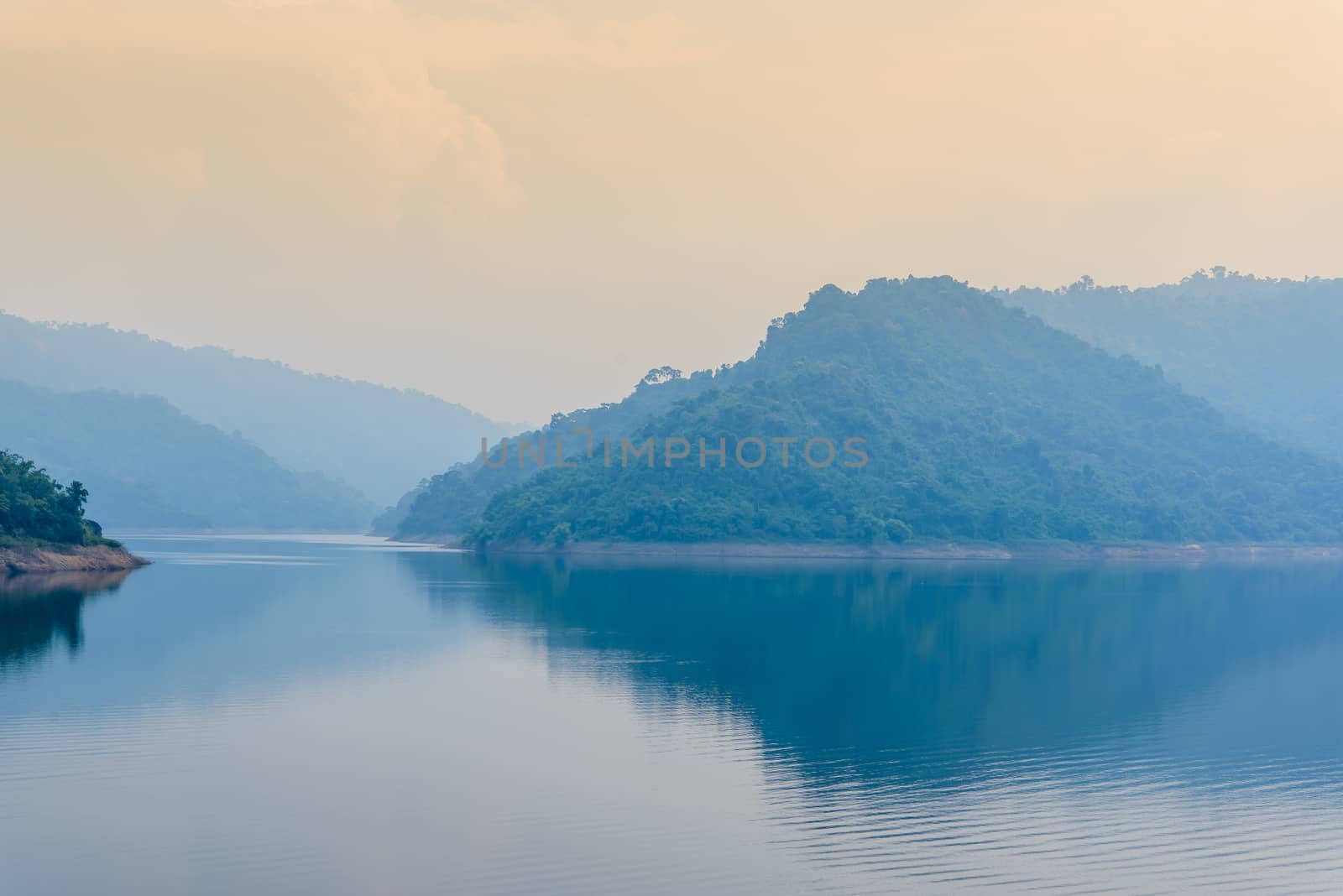 The bright morning at Khundanprakarnchol Dam, Nakornnayok, Thail by toodlingstudio
