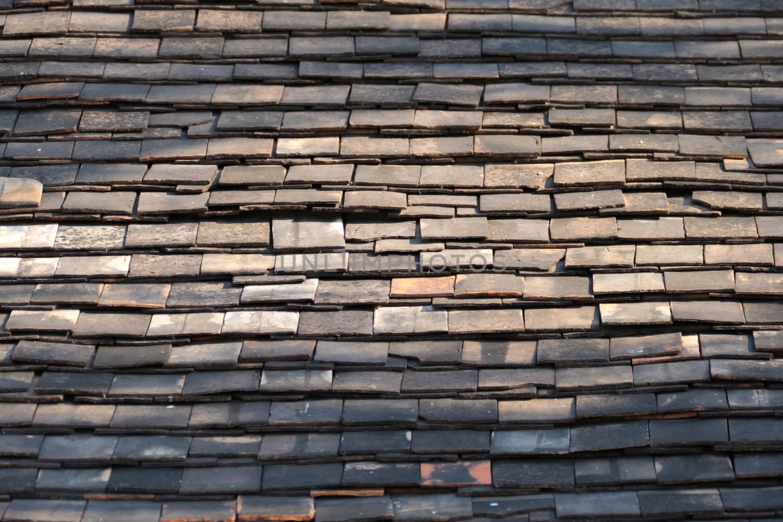 Abstract Detail of Old Slate Roof Tiles by teerawit