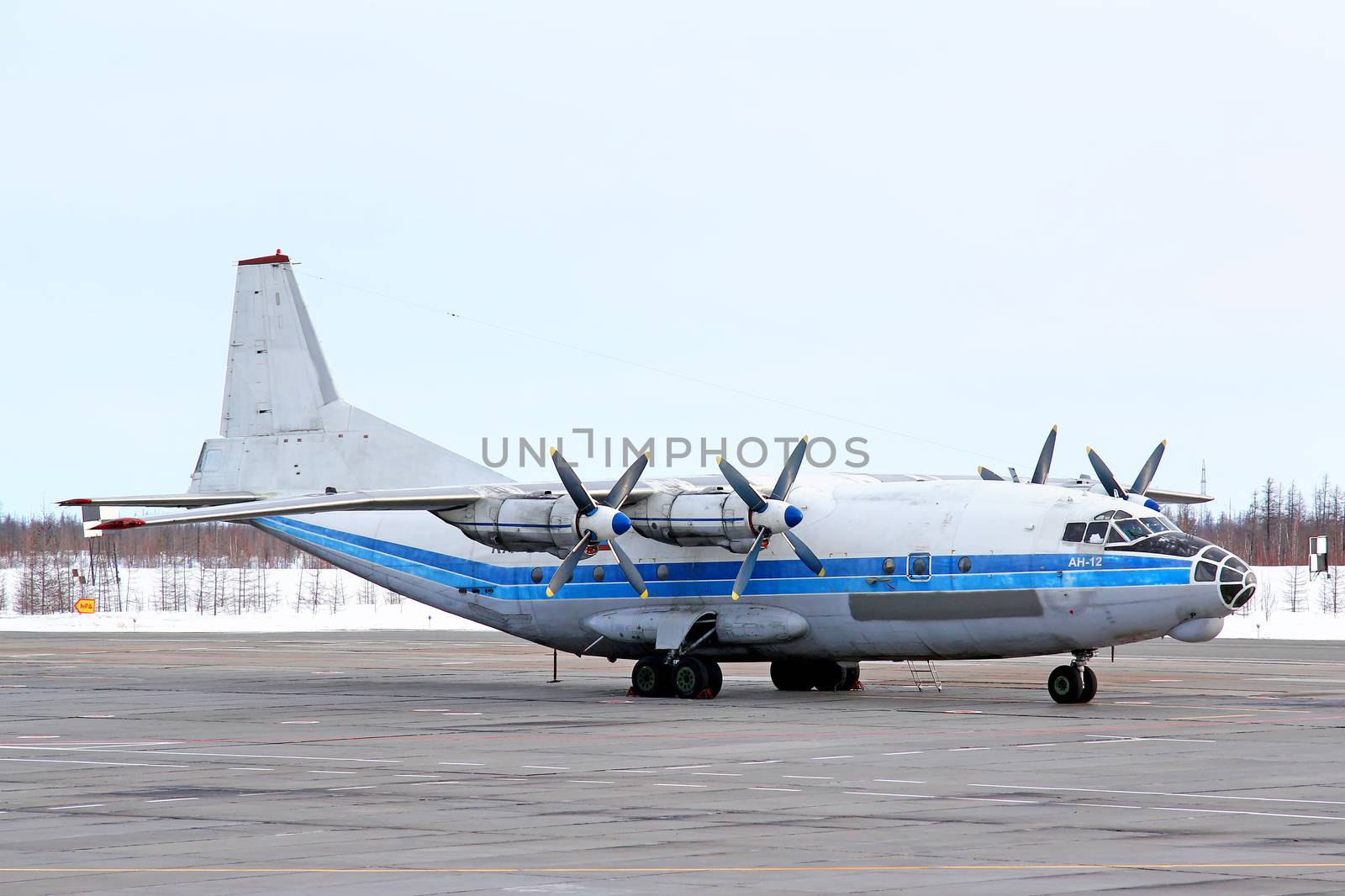 NOVYY URENGOY, RUSSIA - APRIL 8, 2015: Kosmos Aviation Antonov An-12B at the Novyy Urengoy International Airport.