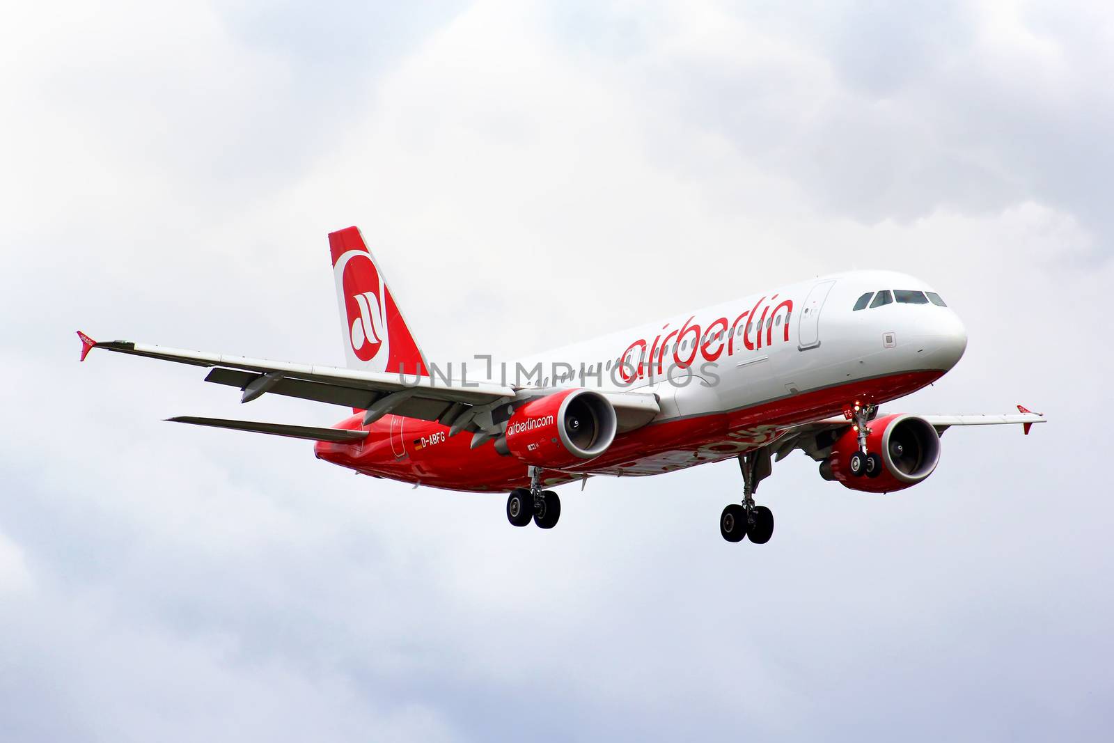 BERLIN, GERMANY - AUGUST 17, 2014: Air Berlin Airbus A320 arrives to the Tegel International Airport.