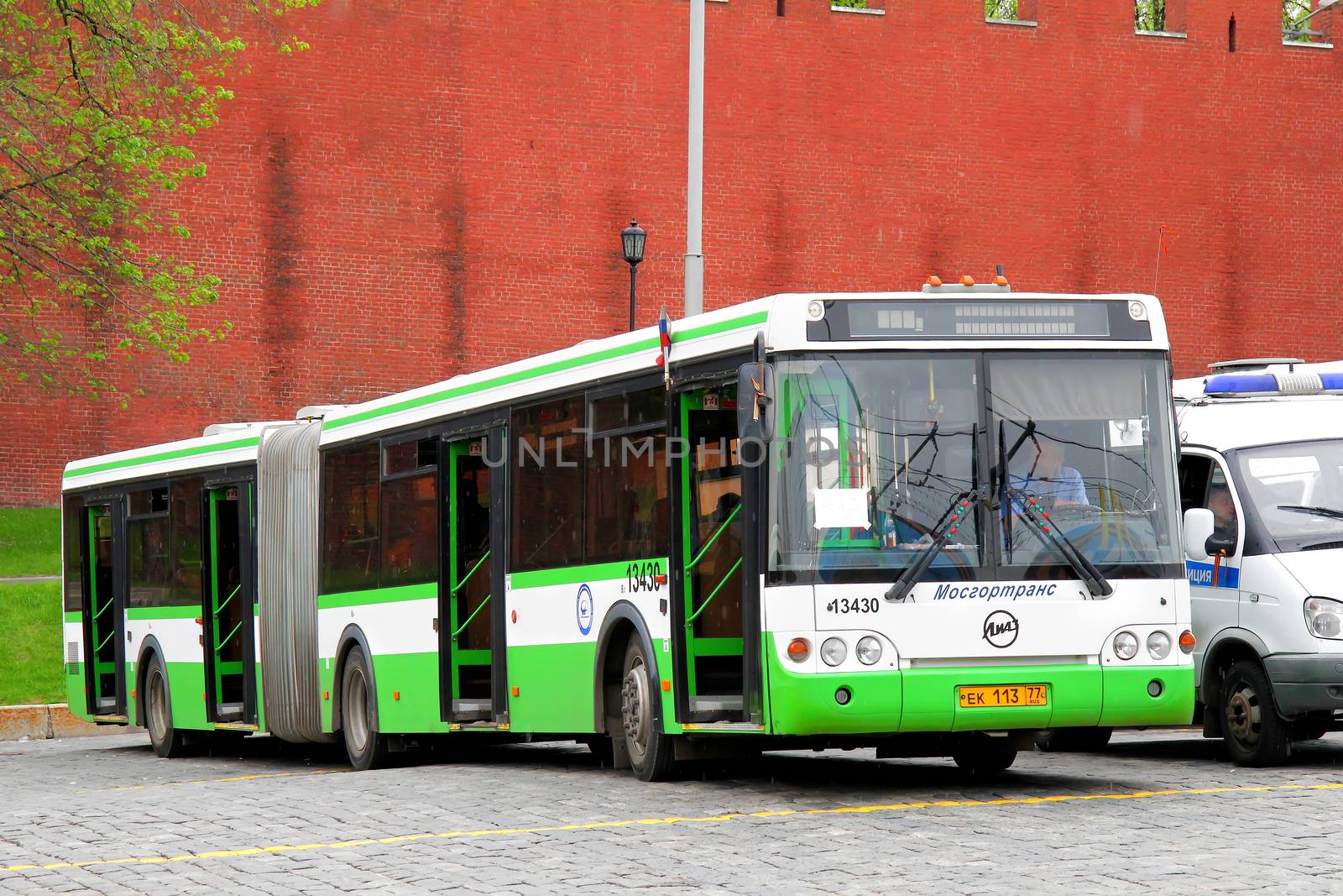 MOSCOW, RUSSIA - MAY 6, 2012: Green LIAZ 6213 articulated city bus at the city street.