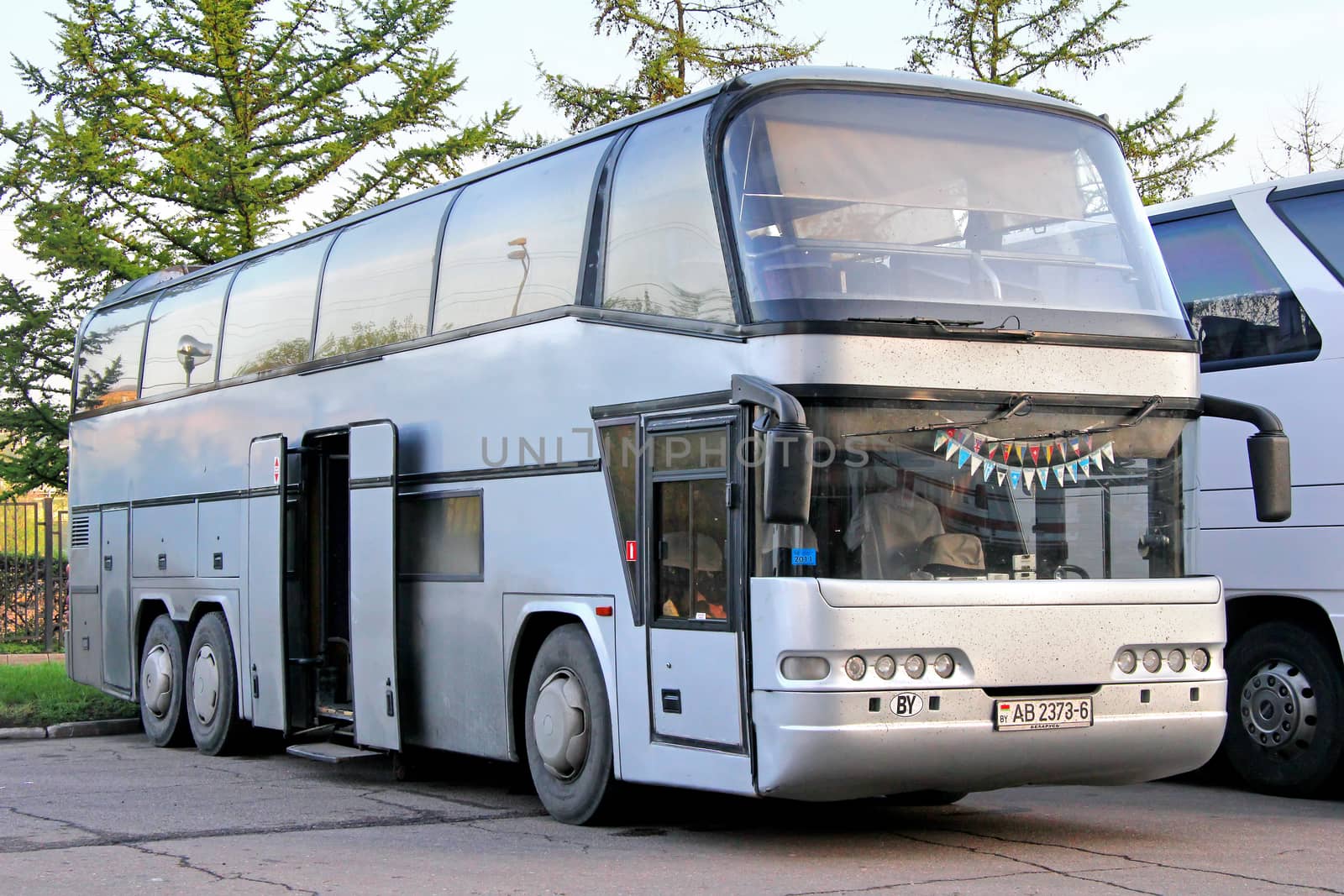 MOSCOW, RUSSIA - MAY 6, 2012: Grey Neoplan N117/3H Spaceliner interurban coach at the city street.