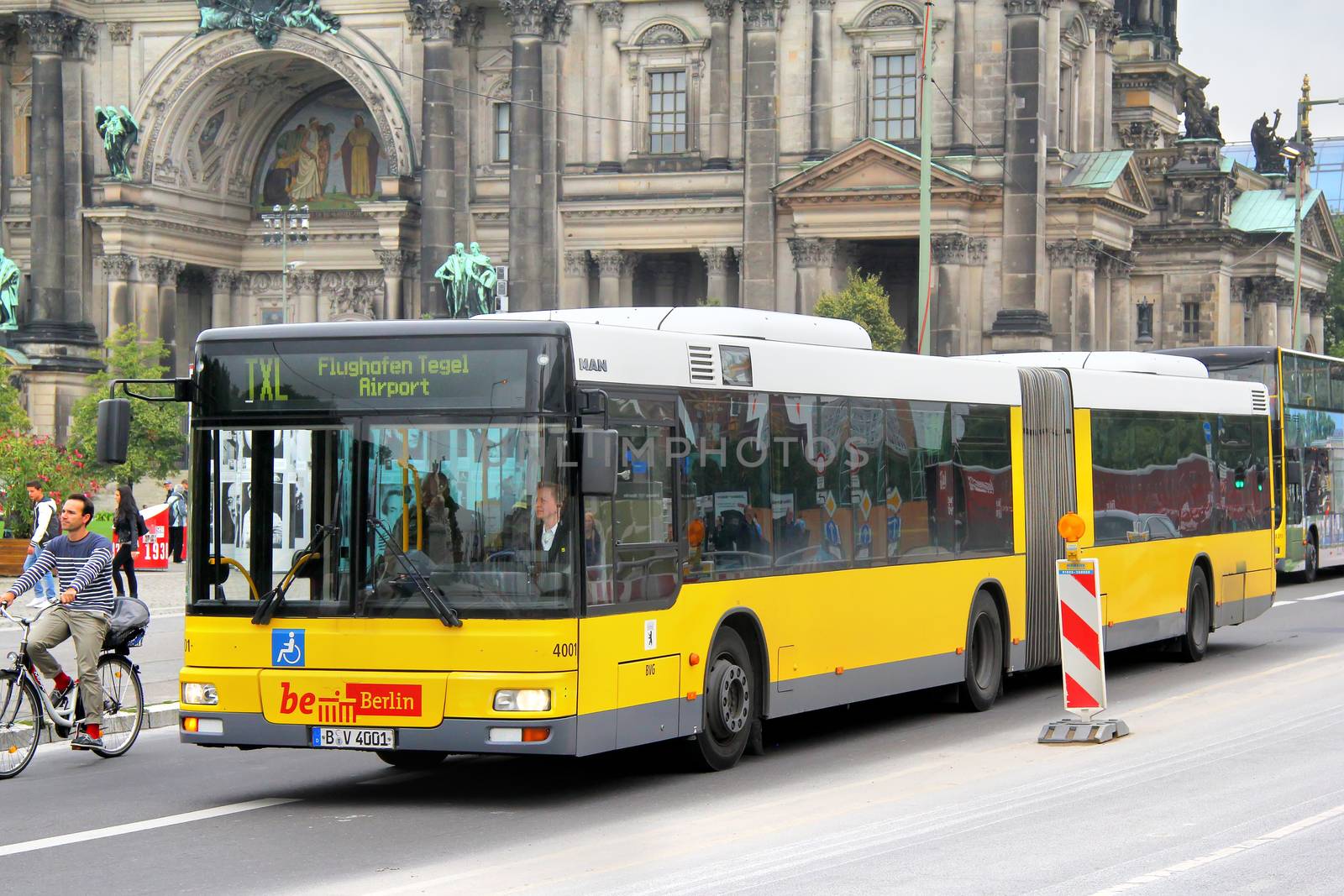 BERLIN, GERMANY - SEPTEMBER 12, 2013: MAN A23 NG313 articulated city bus at the city street.