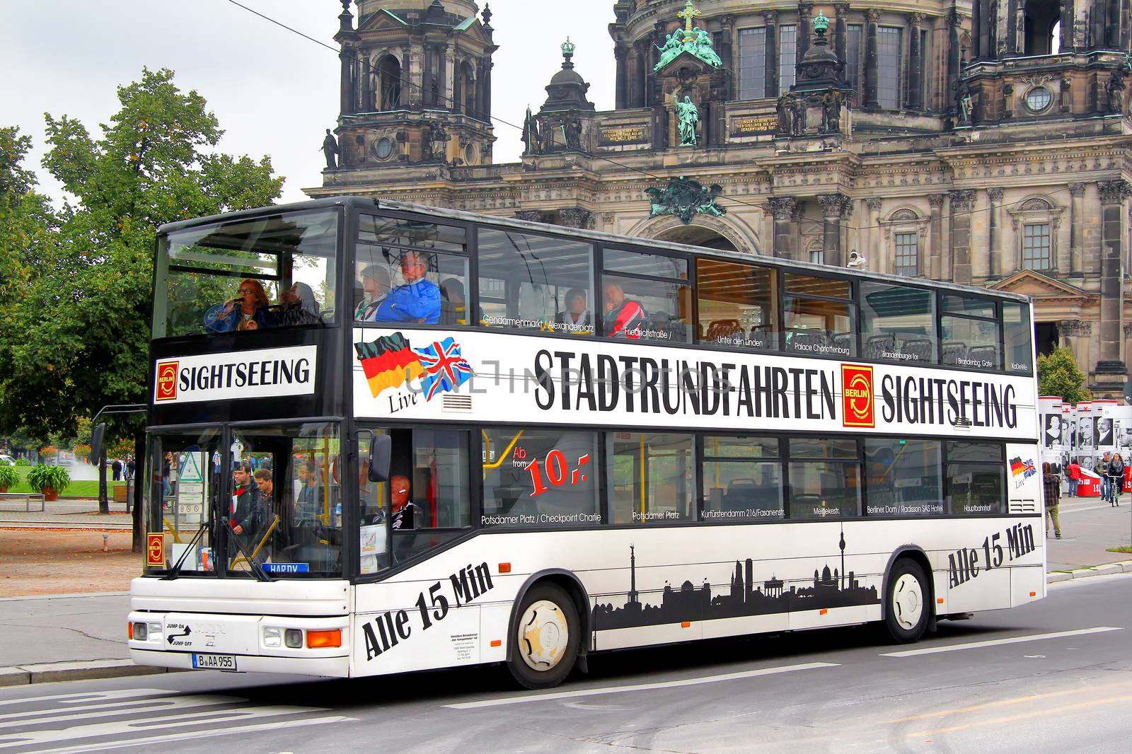 BERLIN, GERMANY - SEPTEMBER 12, 2013: MAN A14 ND202 city sightseeing bus at the city street.