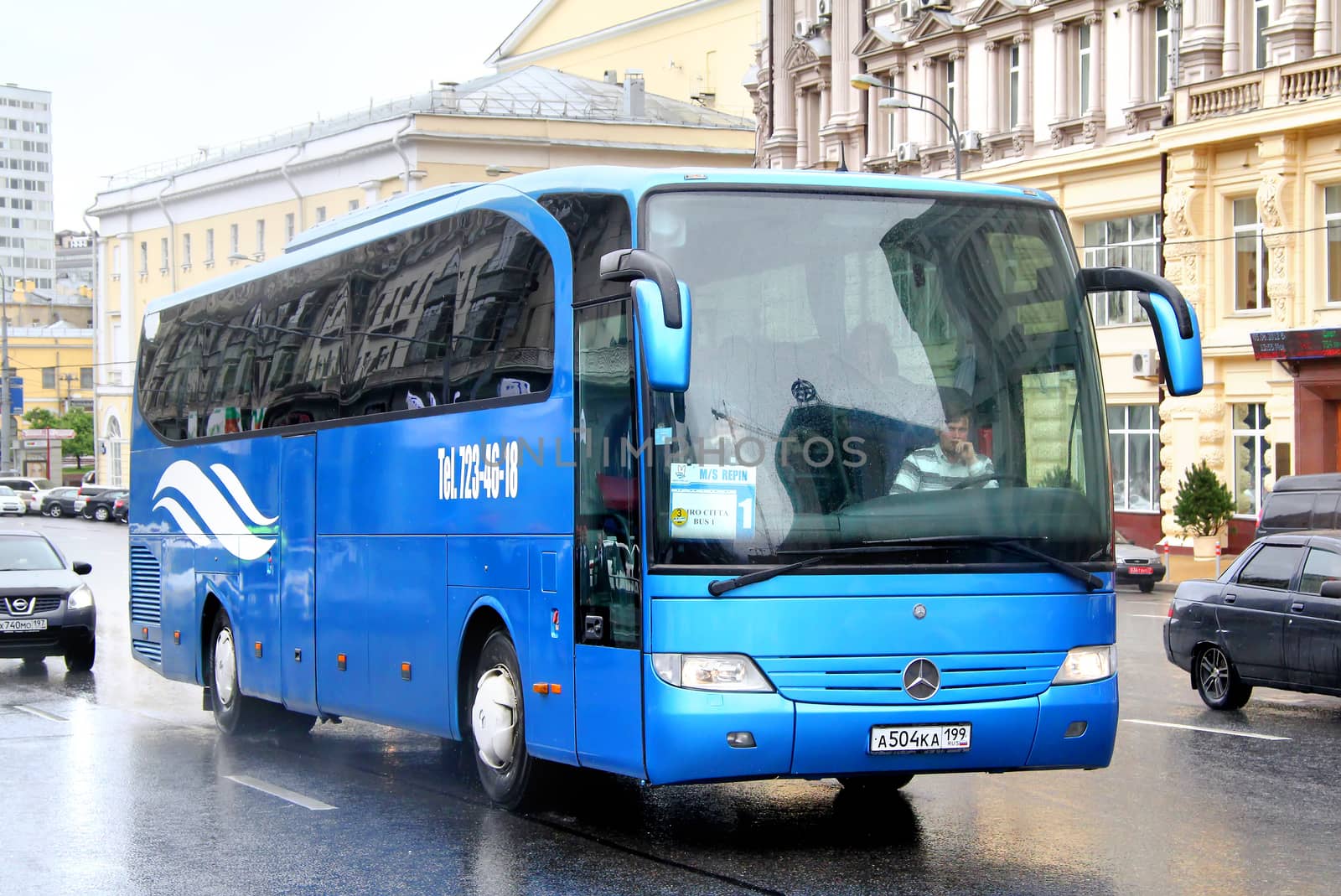 MOSCOW, RUSSIA - JUNE 3, 2012: Blue Mercedes-Benz O580-15RHD Travego interurban coach at the city street.