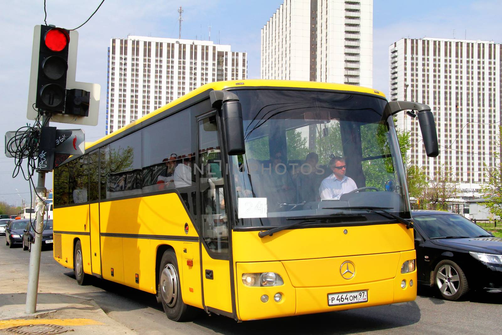 MOSCOW, RUSSIA - MAY 5, 2012: Yellow Mercedes-Benz O560 intouro interurban bus at the city street.