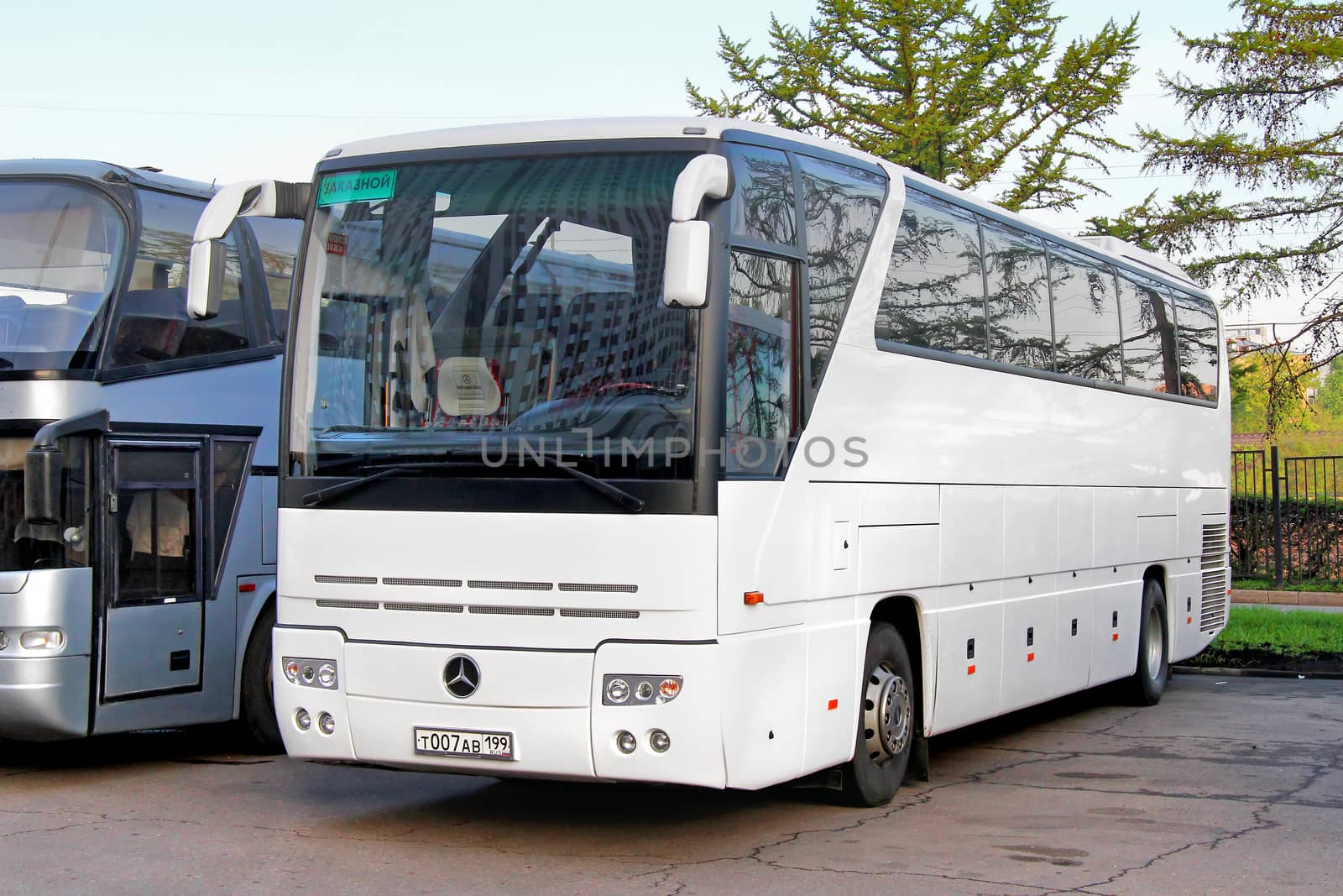 MOSCOW, RUSSIA - MAY 5, 2012: White Mercedes-Benz O350SHD Tourismo interurban coach at the city street.