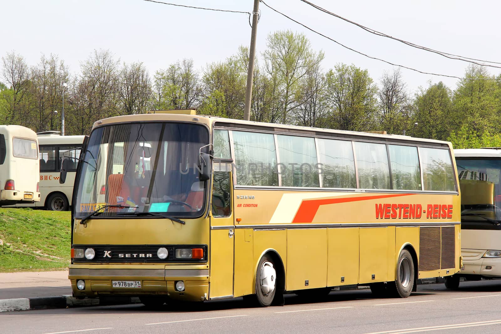 MOSCOW, RUSSIA - MAY 5, 2012: Golden Setra S215HD interurban coach at the city street.