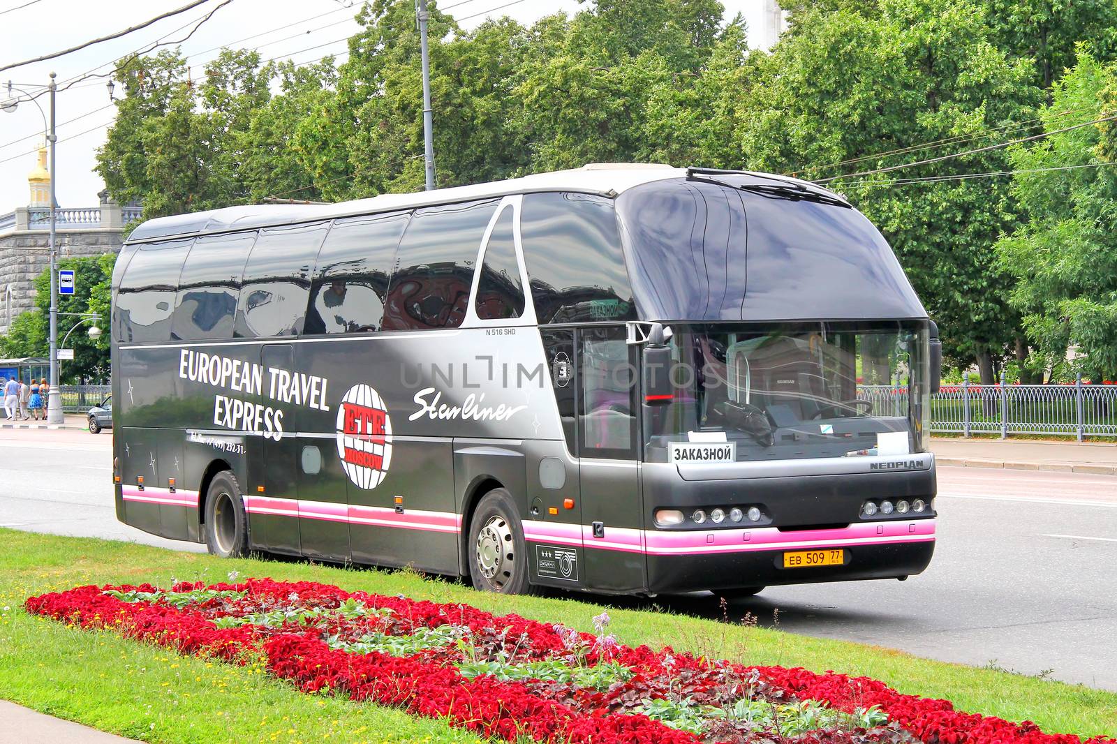 MOSCOW, RUSSIA - JULY 7, 2012: Black Neoplan N516SHD Starilner interurban coach at the city street.