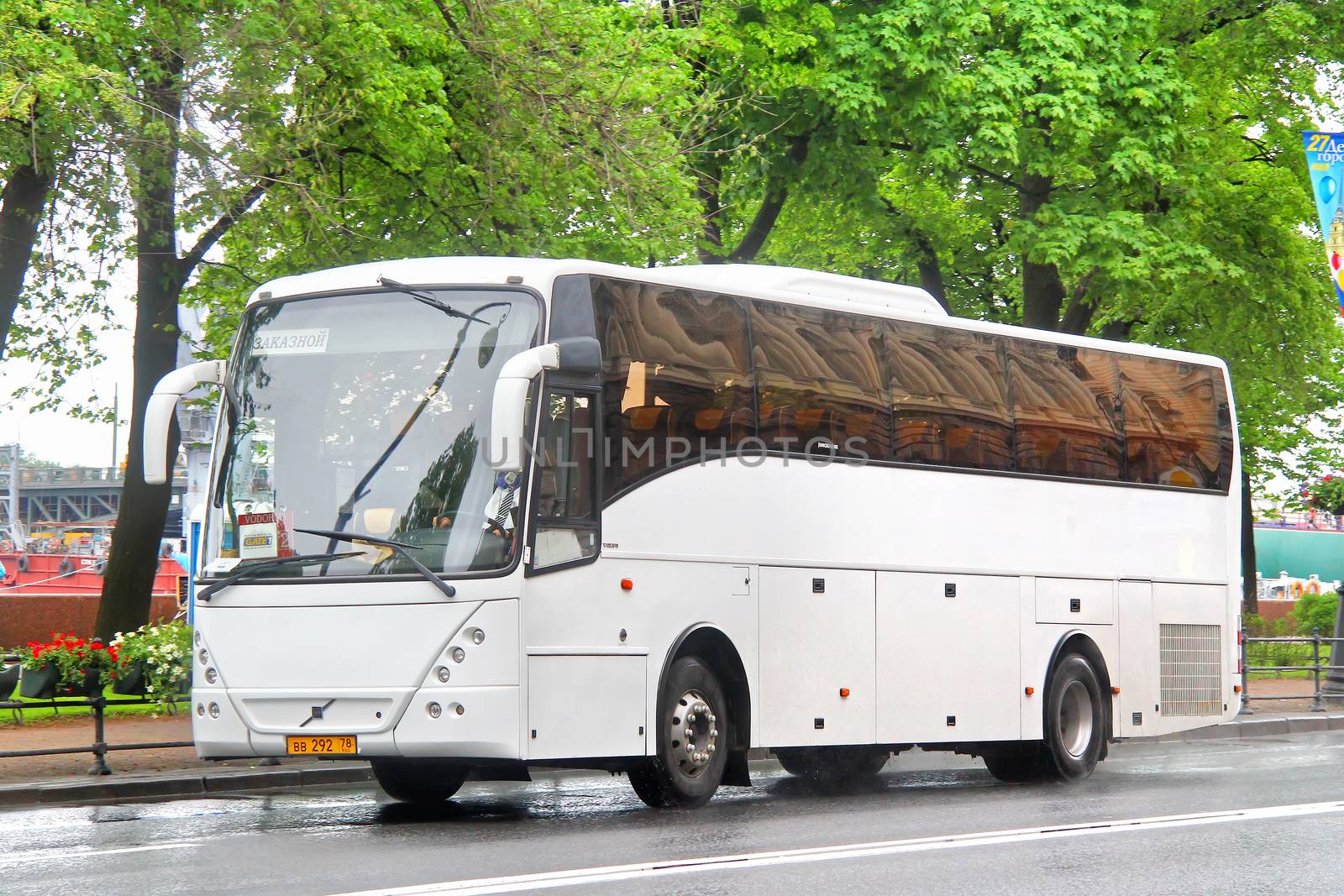 SAINT PETERSBURG, RUSSIA - MAY 26, 2013: White Jonckheere Arrow interurban coach at the city street.
