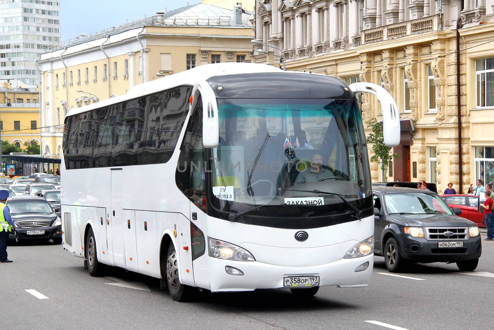 MOSCOW, RUSSIA - JUNE 2, 2013: White Yutong ZK6129H interurban coach at the city street.