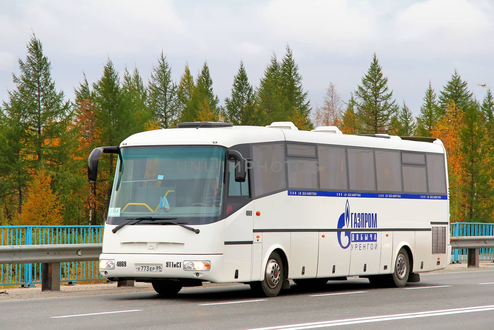 NOVYY URENGOY, RUSSIA - AUGUST 31, 2012: White SOR LH10.5 Arktika coach at the city street.