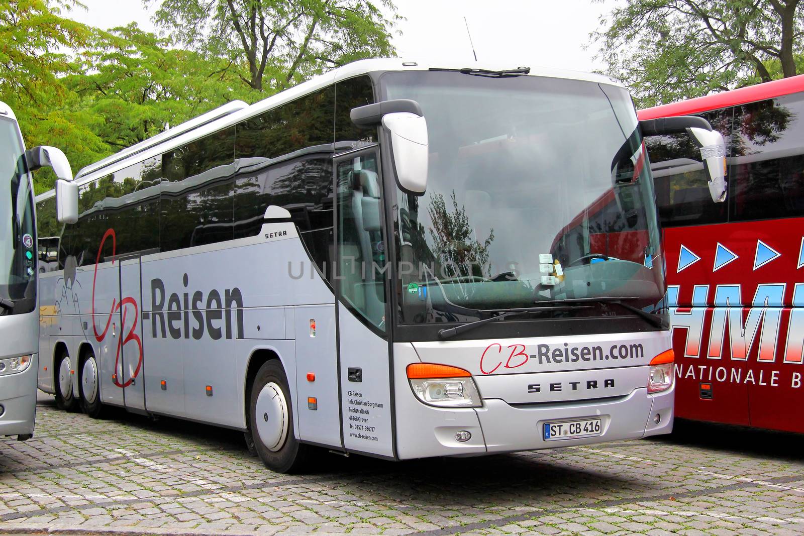 BERLIN, GERMANY - SEPTEMBER 11, 2013: Grey Setra S416GT-HD interurban coach at the city street.