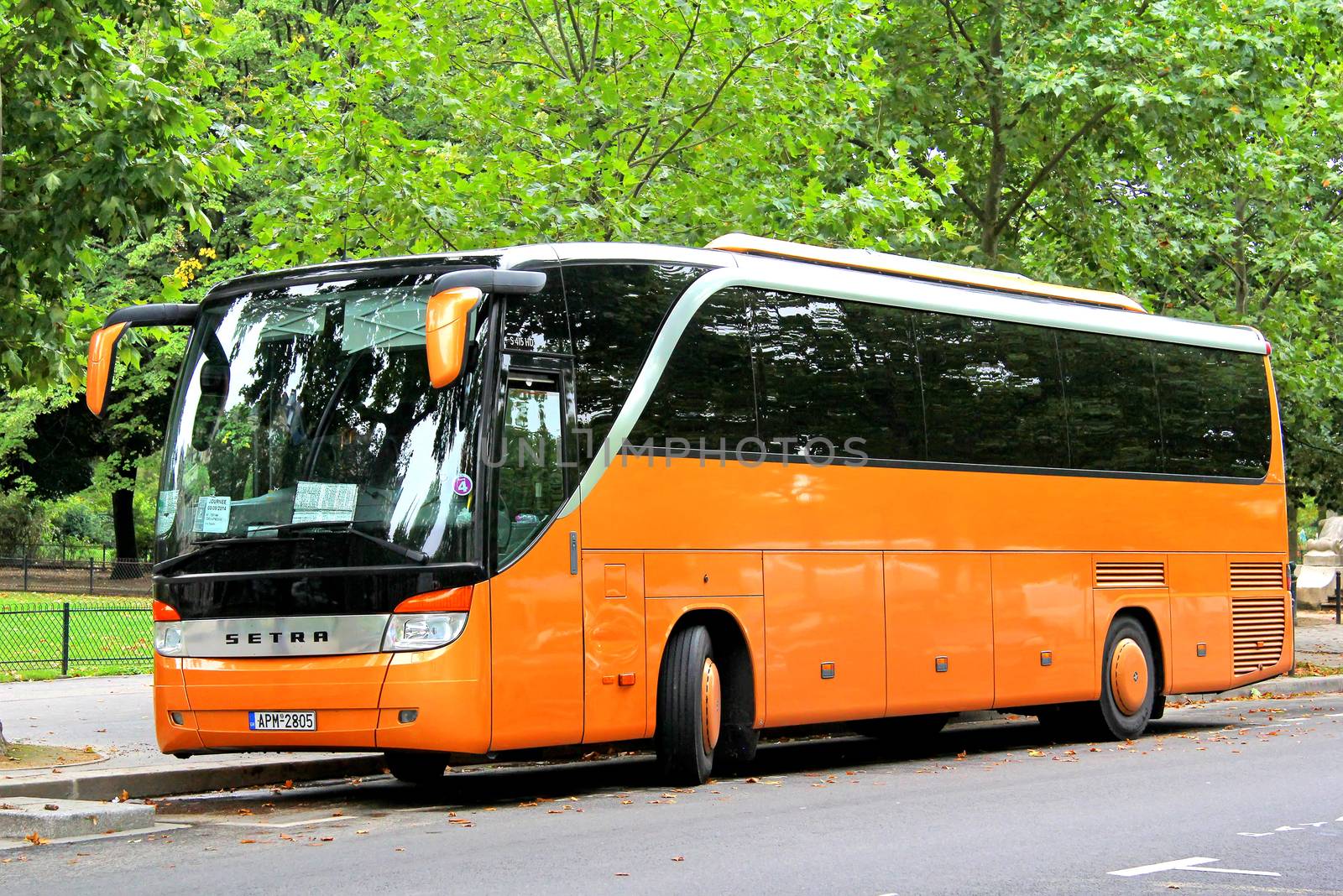 PARIS, FRANCE - AUGUST 8, 2014: Touristic coach Setra S415HD at the city street.