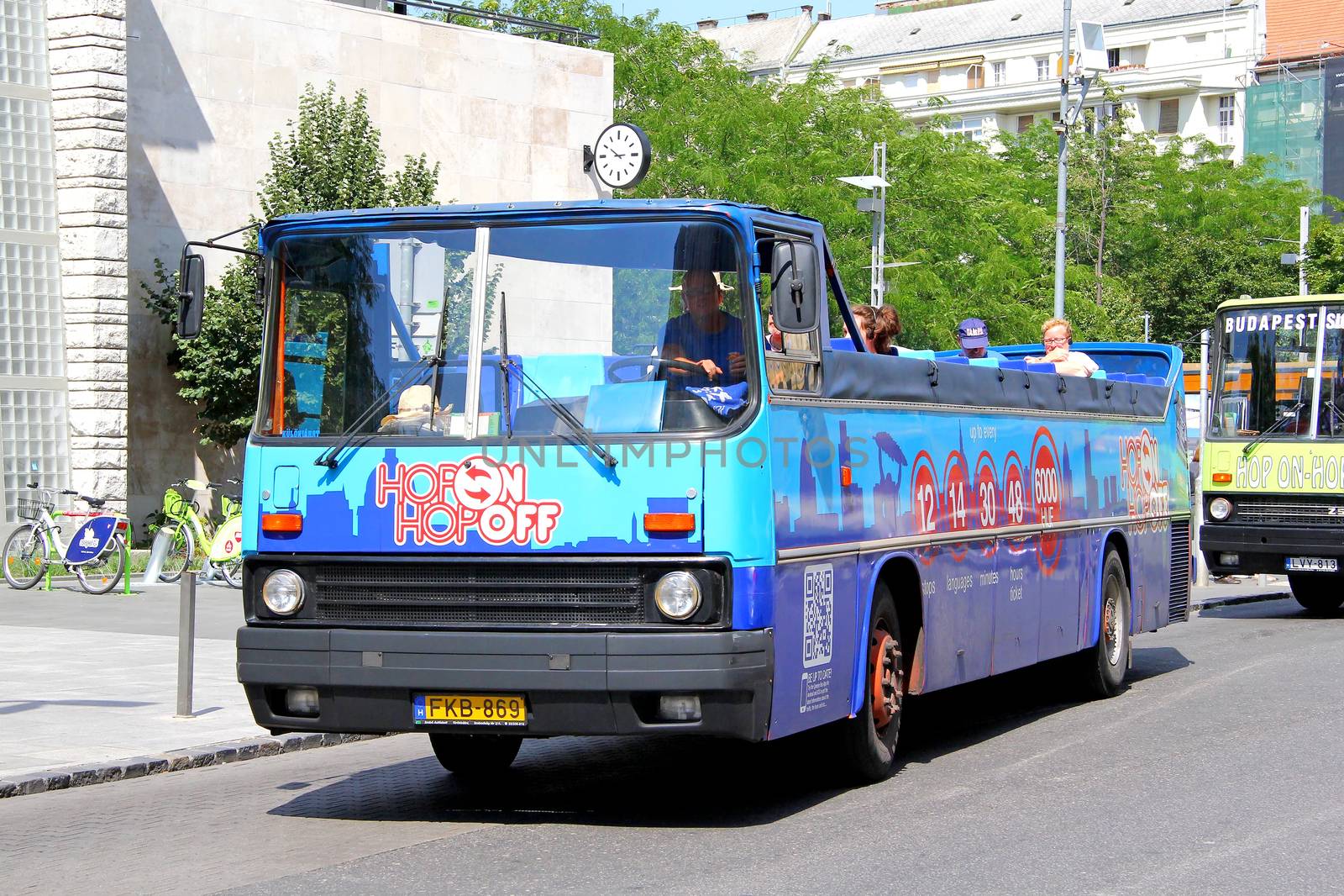BUDAPEST, HUNGARY - JULY 25, 2014: Vintage city sightseeing bus Ikarus 256 at the city street.