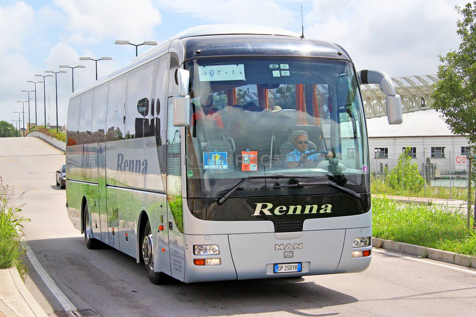 VENICE, ITALY - JULY 30, 2014: Touristic coach MAN R07 Lion's Coach at the city street.