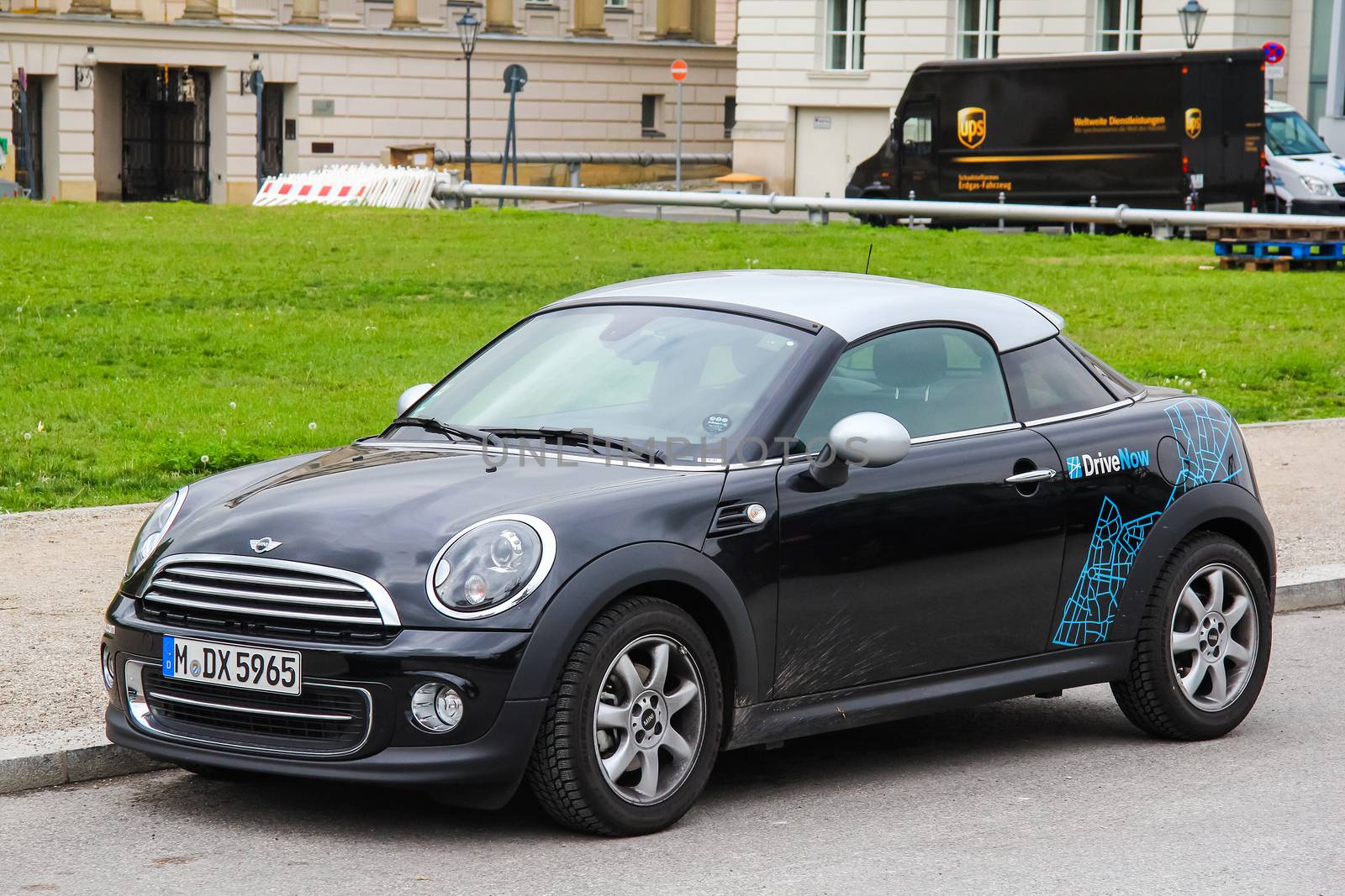 BERLIN, GERMANY - SEPTEMBER 12, 2013: Motor car Mini Cooper Coupe at the city street.