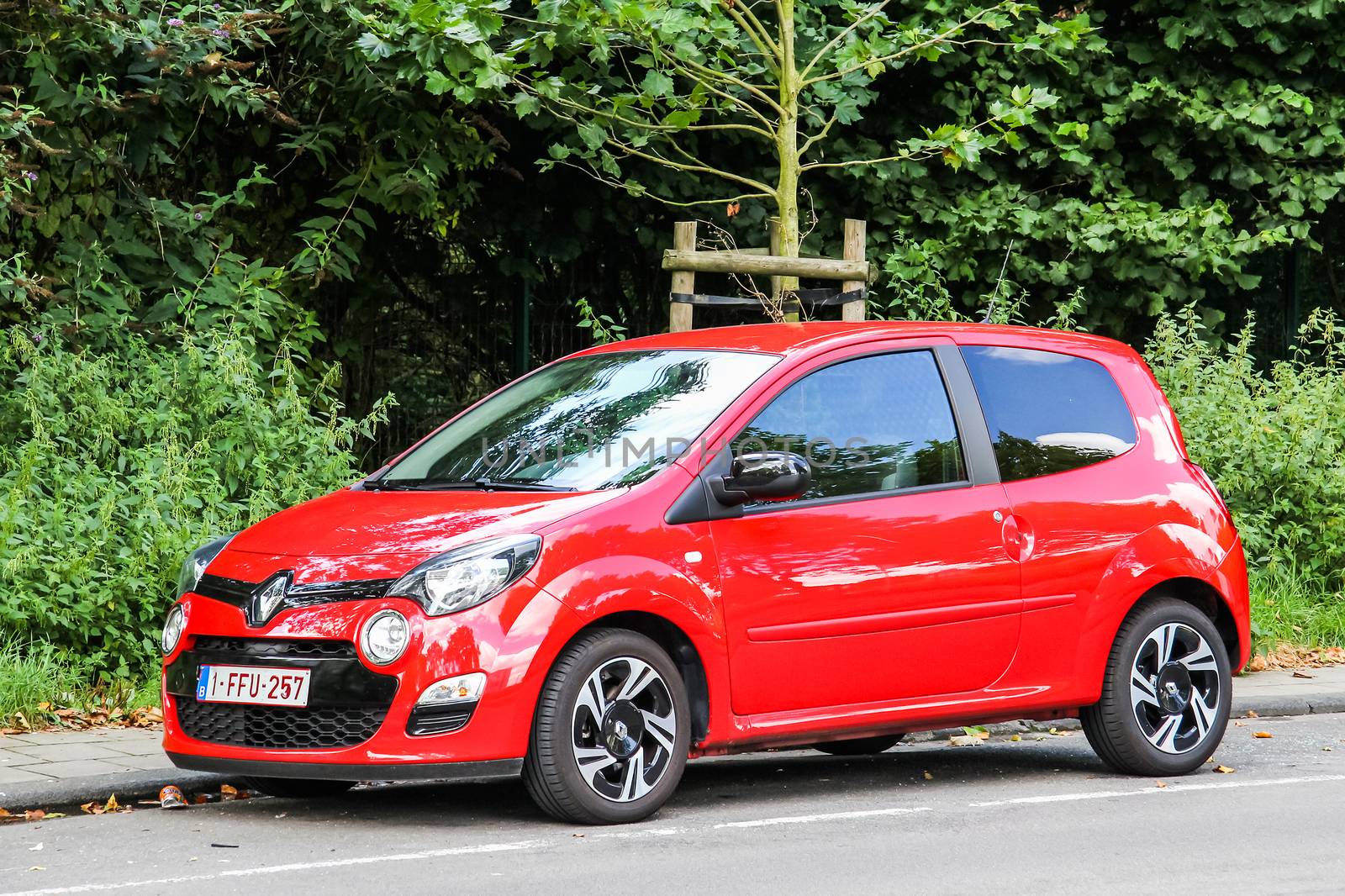 BRUSSELS, BELGIUM - AUGUST 9, 2014: Motor car Renault Twingo at the city street.