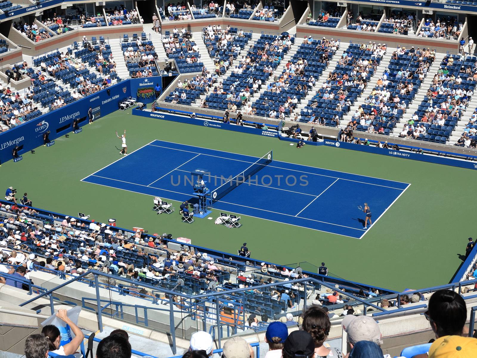 A crowded Arthur Ashe Stadium for a 2014 U.S. Open tennis match, Azarenka vs Makarova.