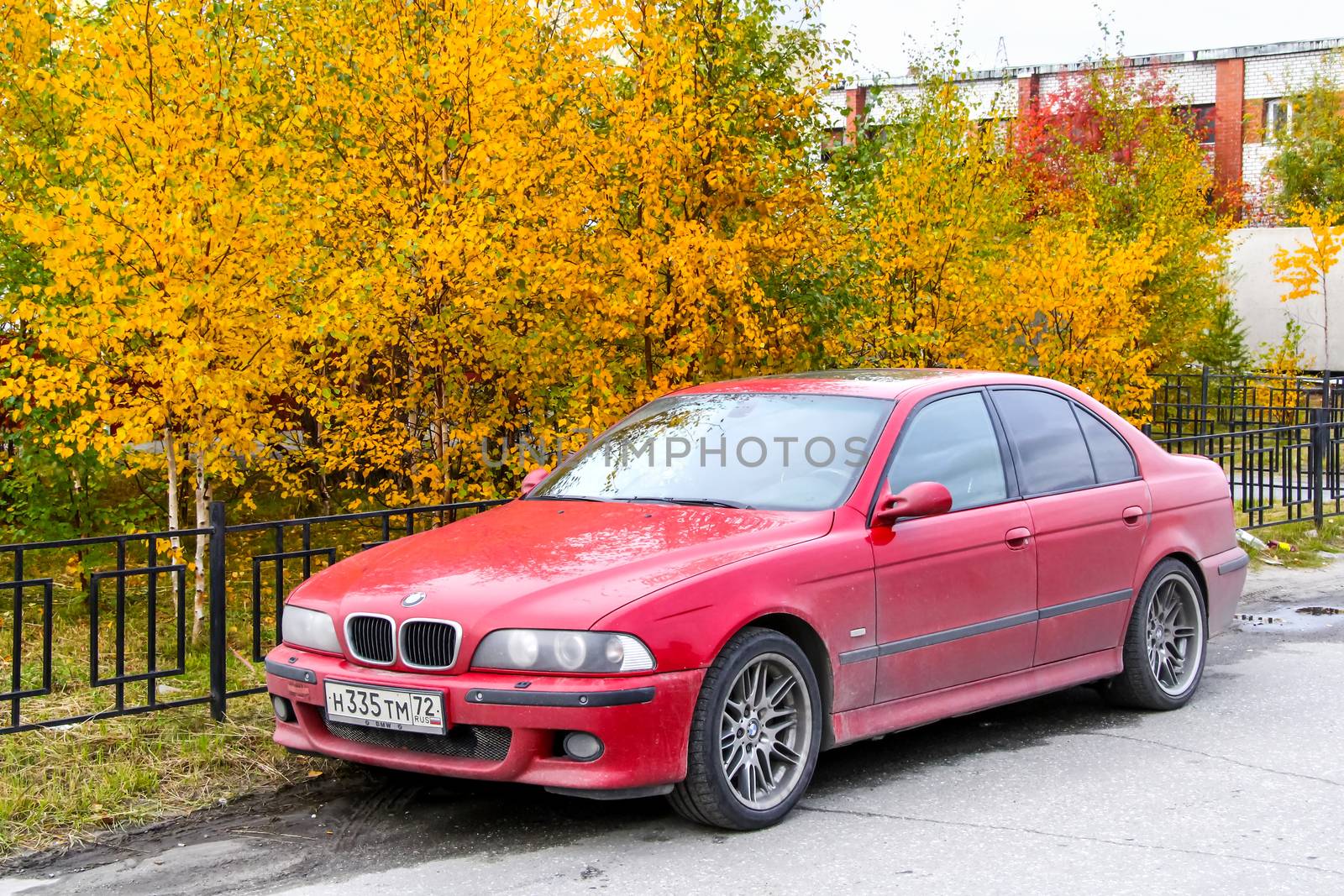 NOVYY URENGOY, RUSSIA - SEPTEMBER 8, 2012: Motor car BMW E39 M5 at the city street.
