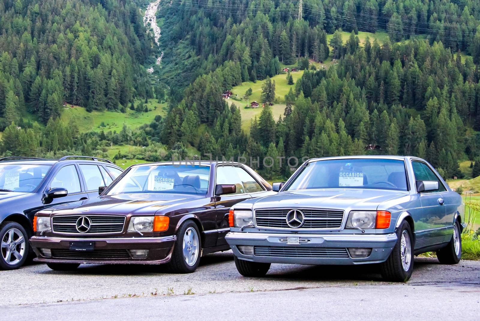 VALAIS, SWITZERLAND - AUGUST 5, 2014: Motor cars Mercedes Benz W126 SEC-class at the used cars trade center.