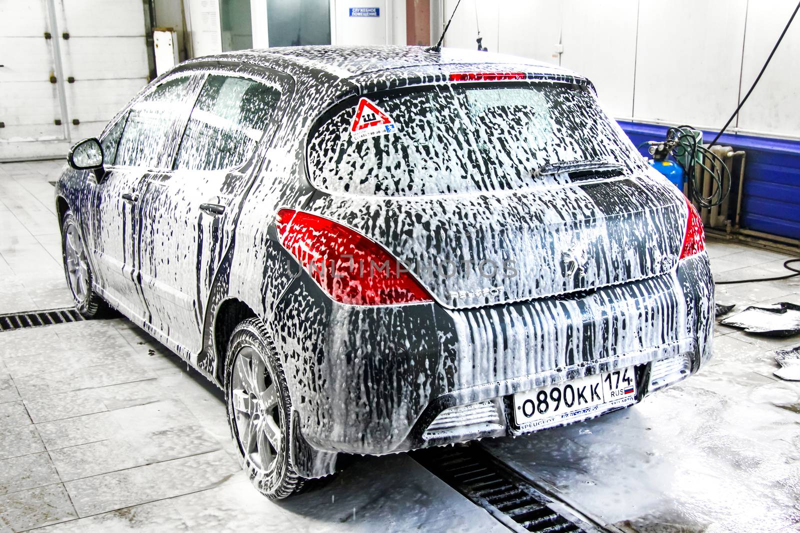 ASHA, RUSSIA - JANUARY 19, 2012: Motor car Peugeot 308 at the car wash service station.