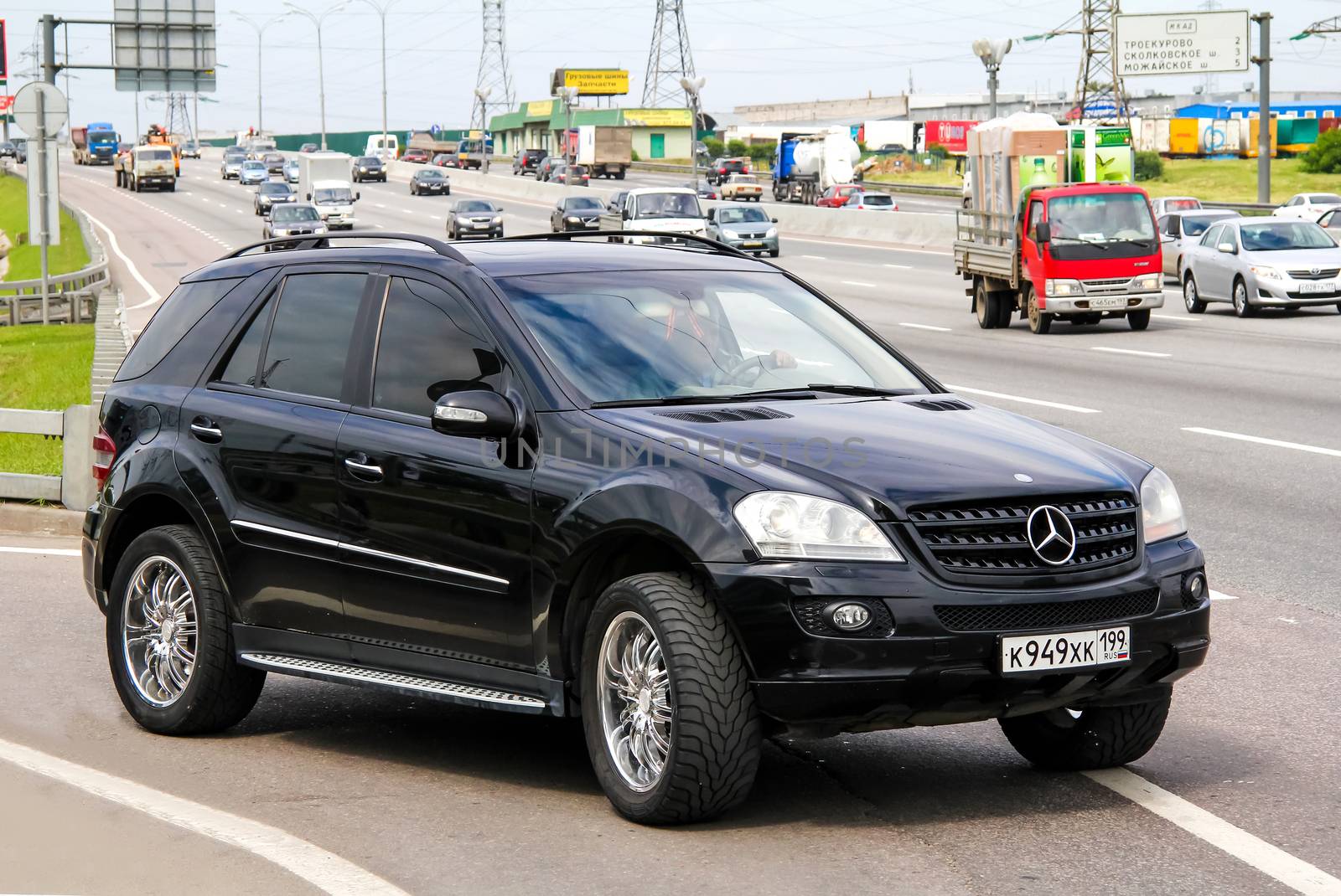 MOSCOW, RUSSIA - JUNE 2, 2012: Motor car Mercedes-Benz W164 M-class at the interurban freeway.