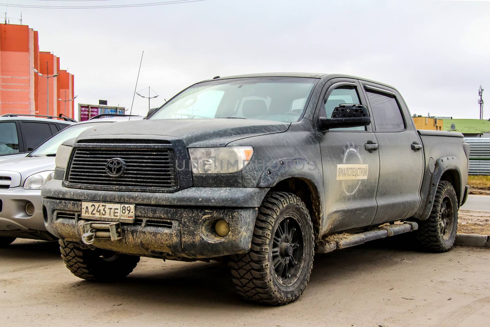 NOVYY URENGOY, RUSSIA - JUNE 11, 2014: Motor car Toyota Tundra at the city street.