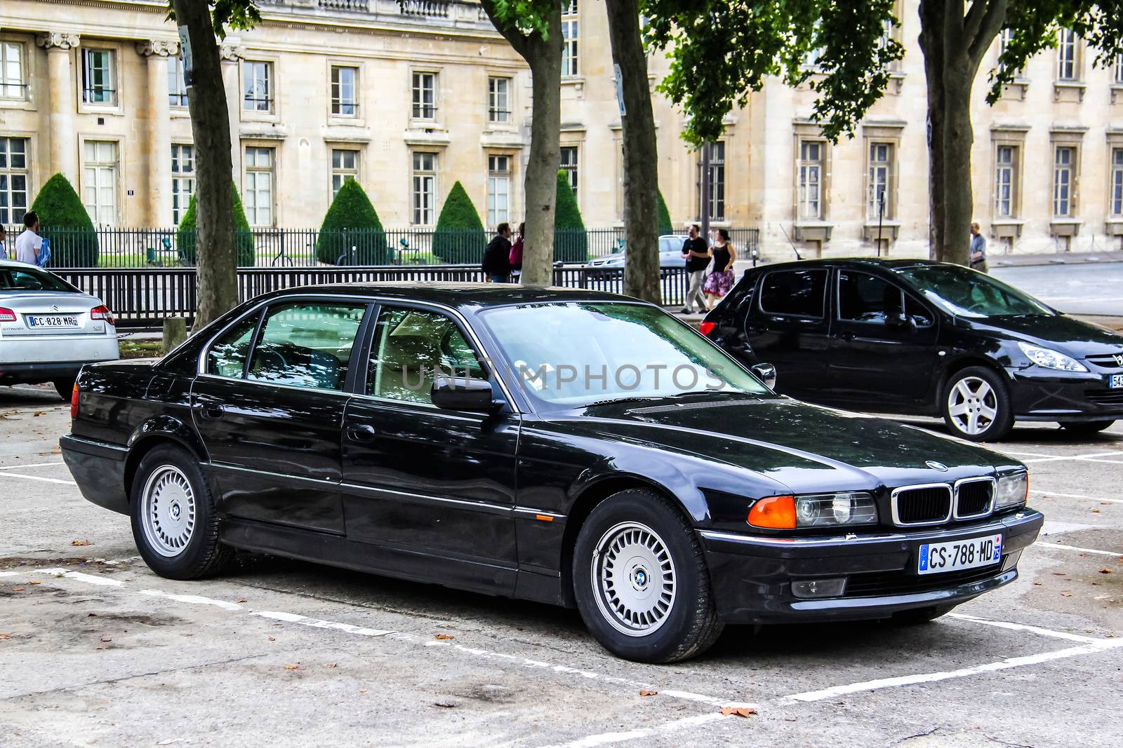 PARIS, FRANCE - AUGUST 8, 2014: Motor car BMW E38 7-series at the city street.