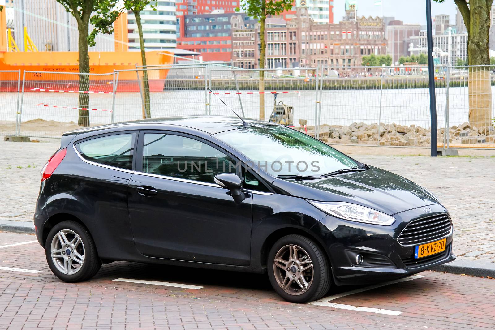 ROTTERDAM, NETHERLANDS - AUGUST 9, 2014: Motor car Ford Fiesta at the city street.