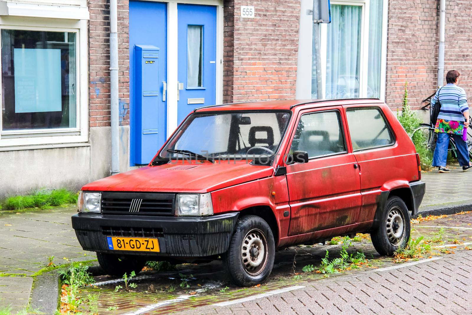 AMSTERDAM, NETHERLANDS - AUGUST 10, 2014: Motor car Fiat Panda at the city street.