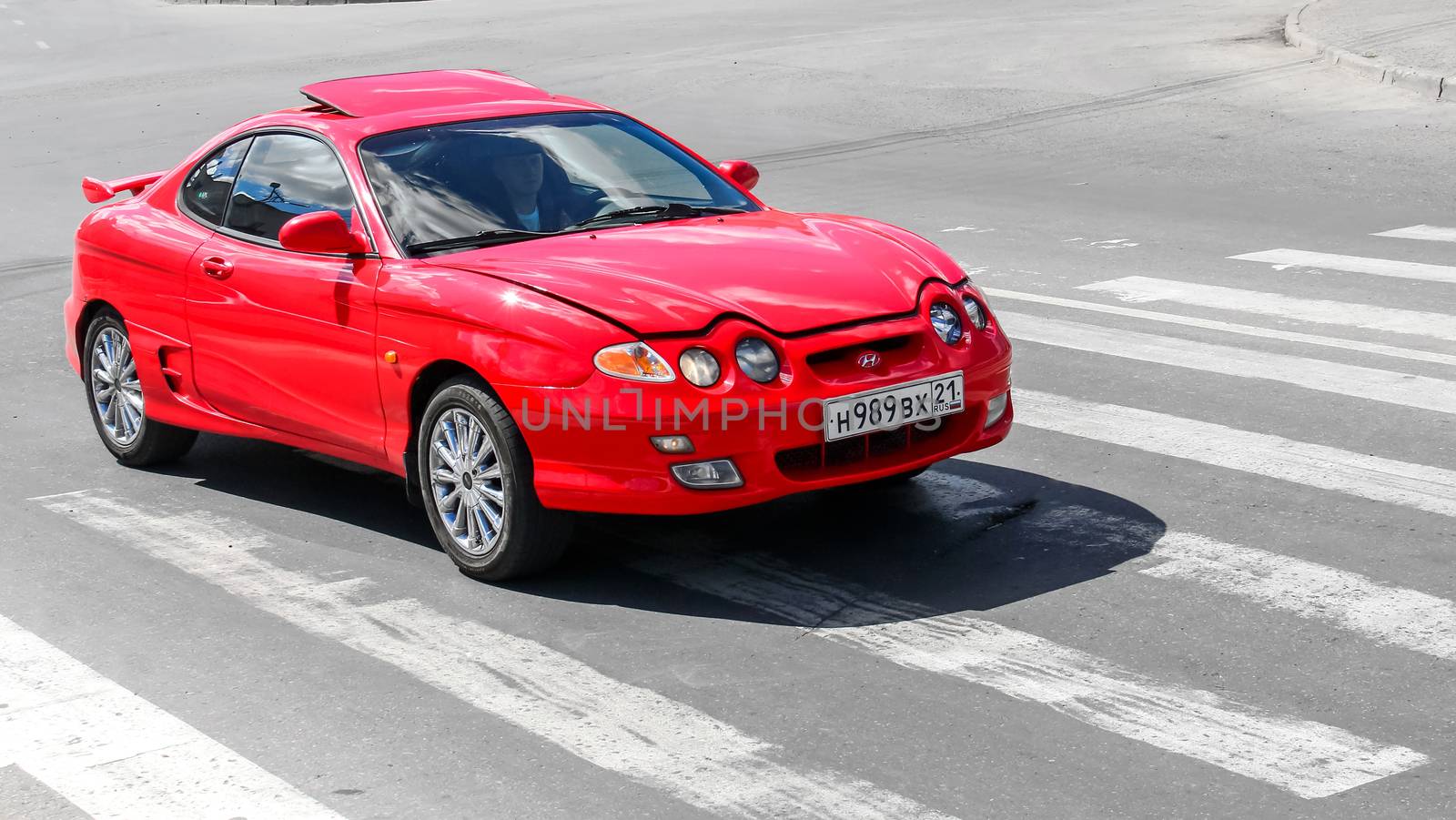 CHEBOKSARY, RUSSIA - JULY 20, 2014: Motor car Hyundai Coupe at the city street.