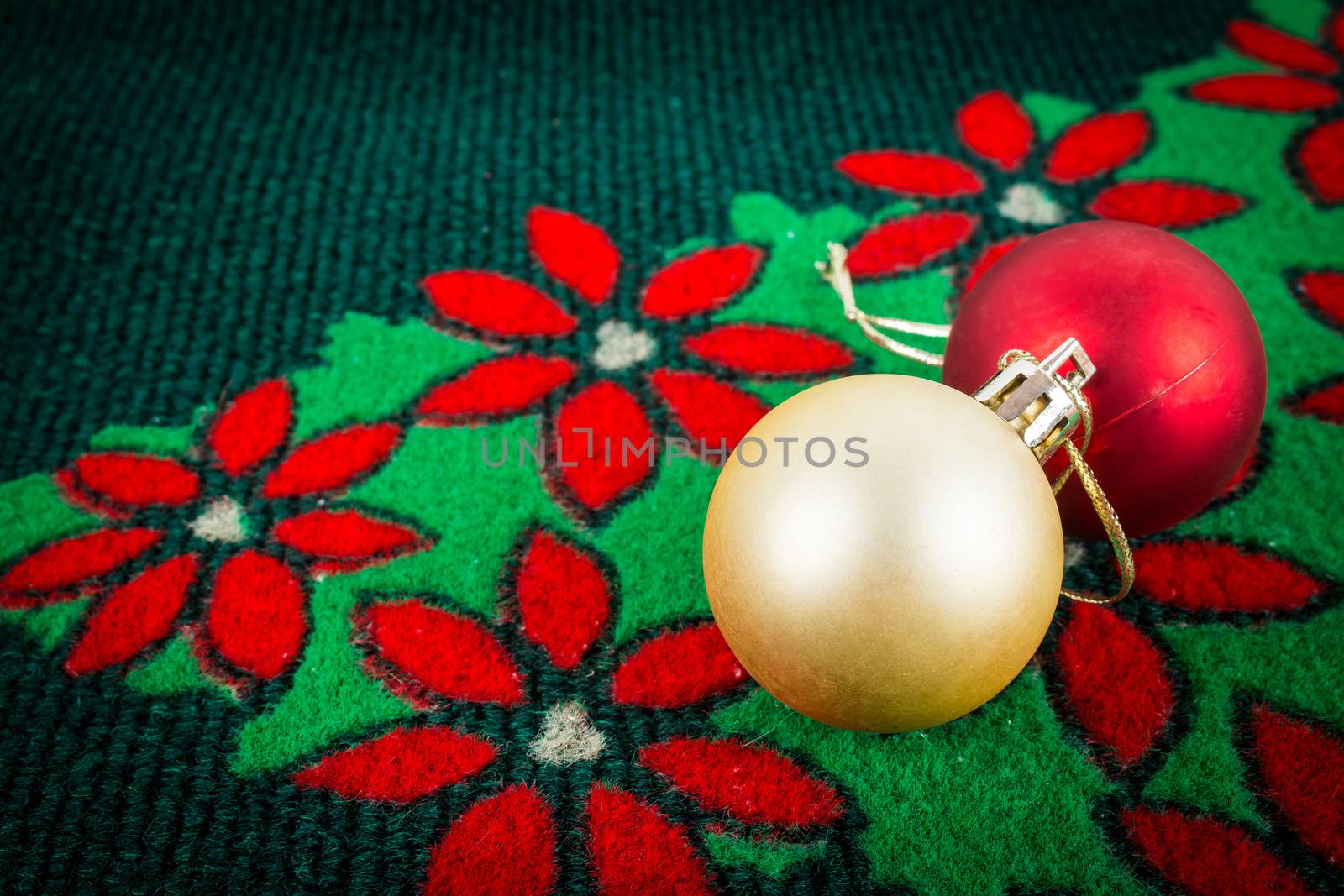 gold and red ball on christmas carpet , use for background