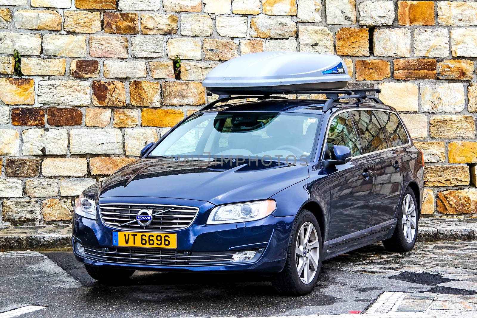 TYROL, AUSTRIA - JULY 29, 2014: Motor car Volvo V70 at the Grossglockner High Alpine road.