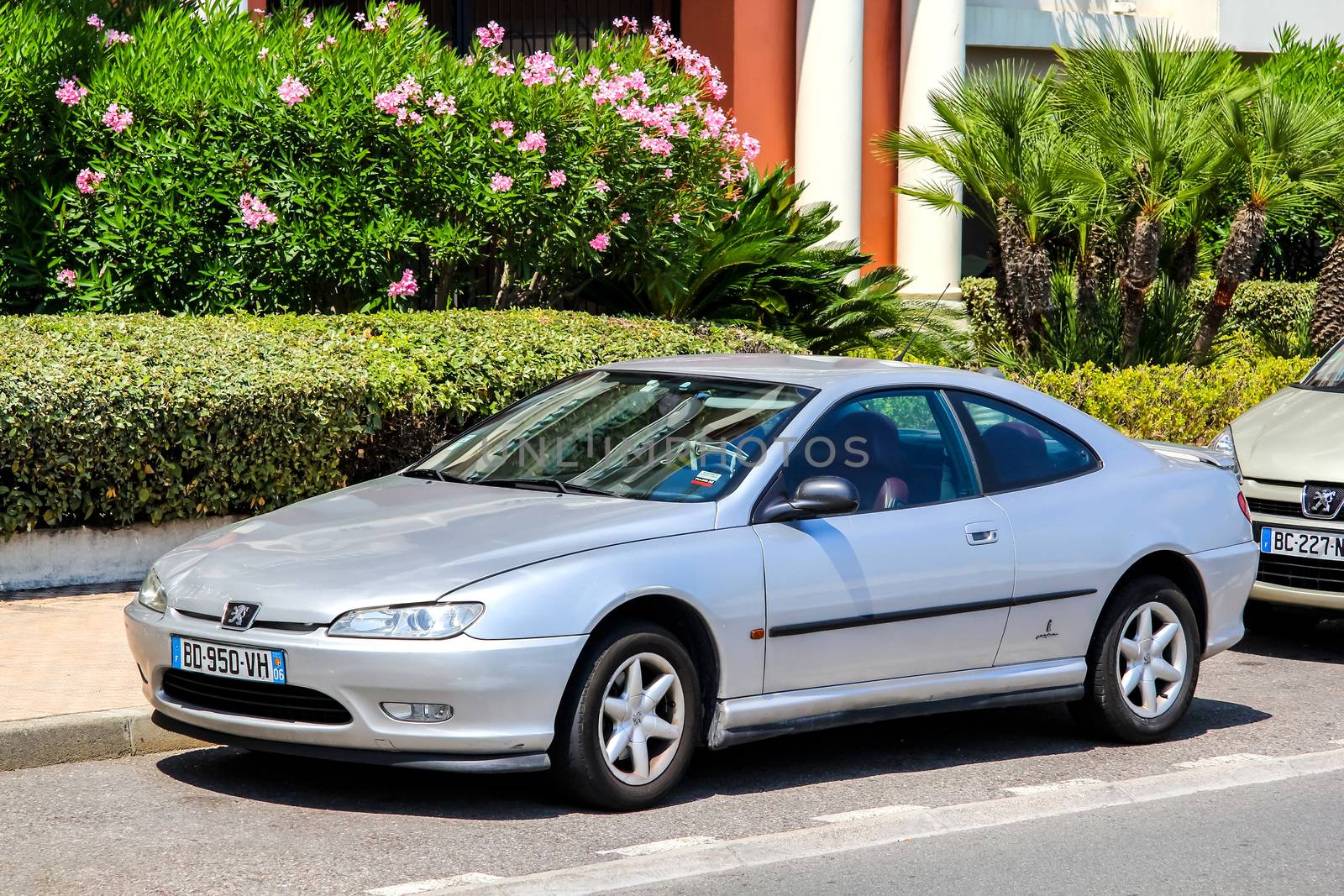 MENTON, FRANCE - AUGUST 2, 2014: Motor car Peugeot 406 Coupe at the city street.