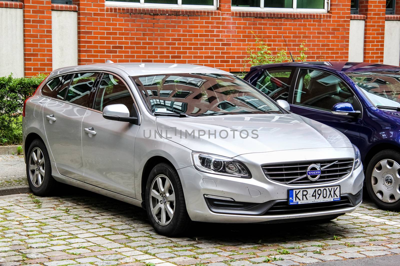 BERLIN, GERMANY - AUGUST 16, 2014: Motor car Volvo V60 at the city street.