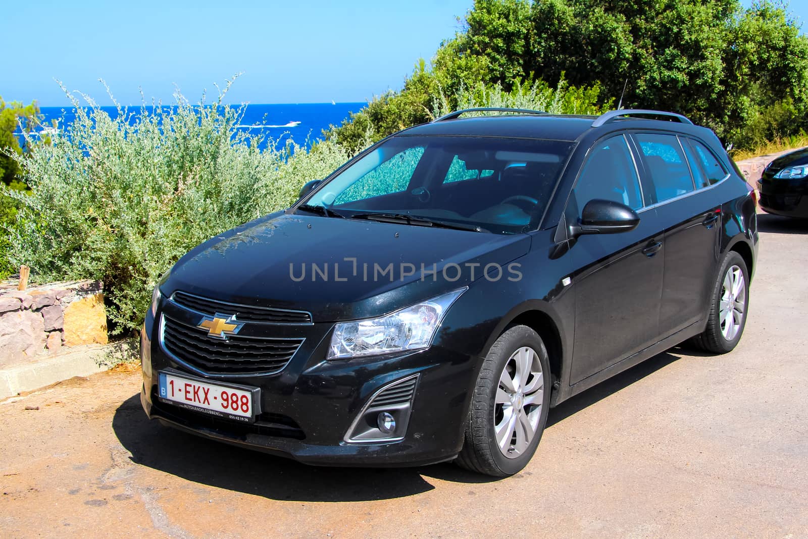 RIVIERA, FRANCE - AUGUST 3, 2014: Motor car Chevrolet Cruze at the interurban road.