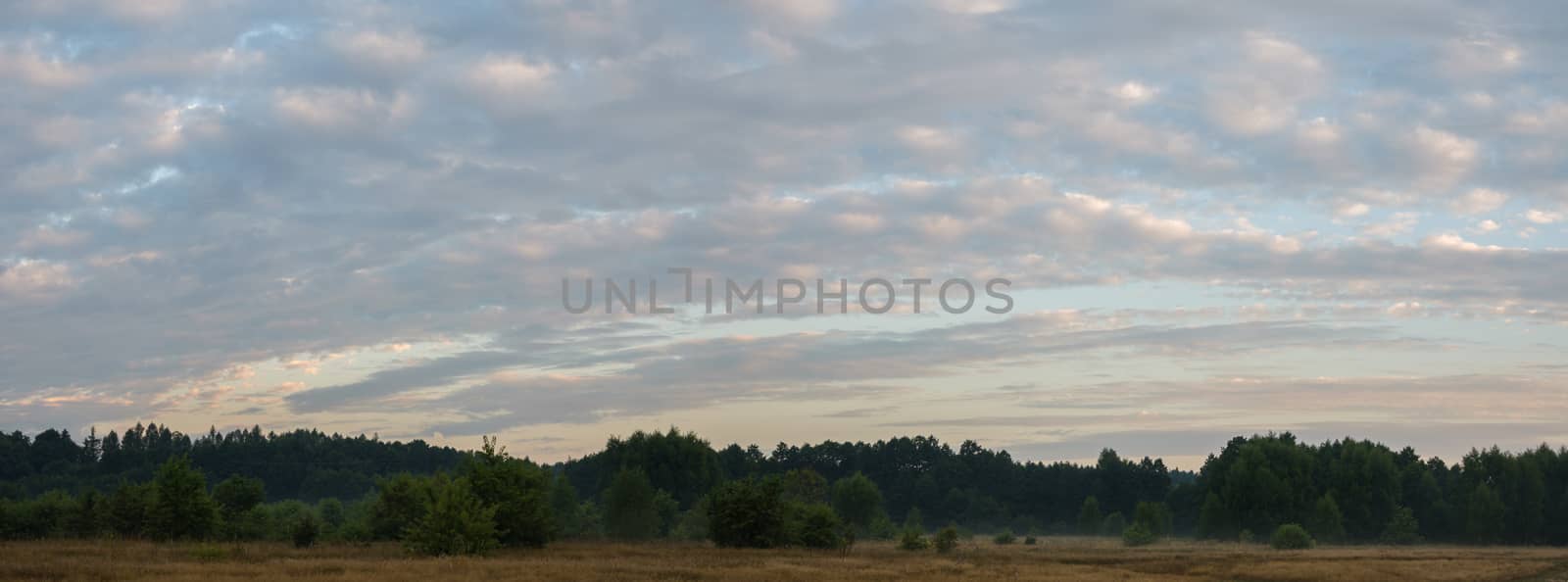 sun behind the clouds on a warm day, nature series