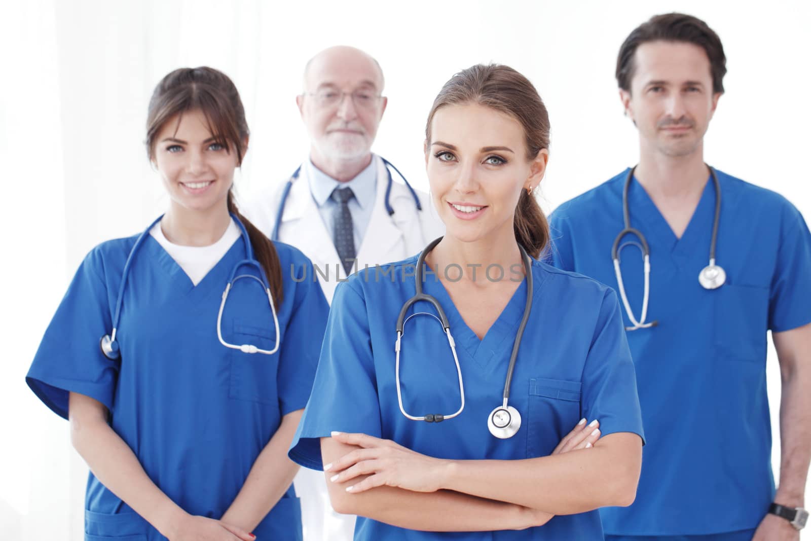 Team of professional doctors isolated on white background