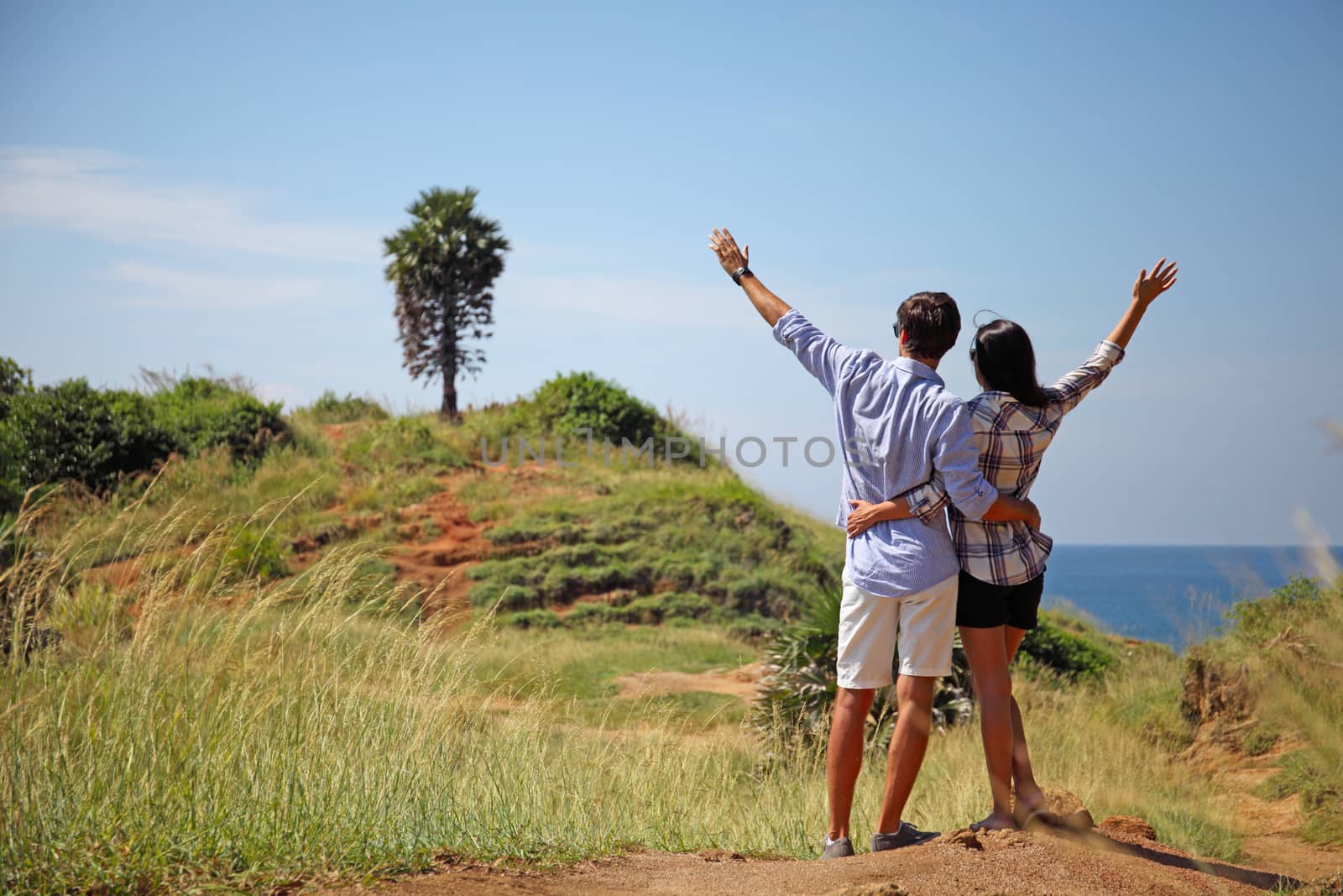 Young couple enjoy beautiful sea view on vacation