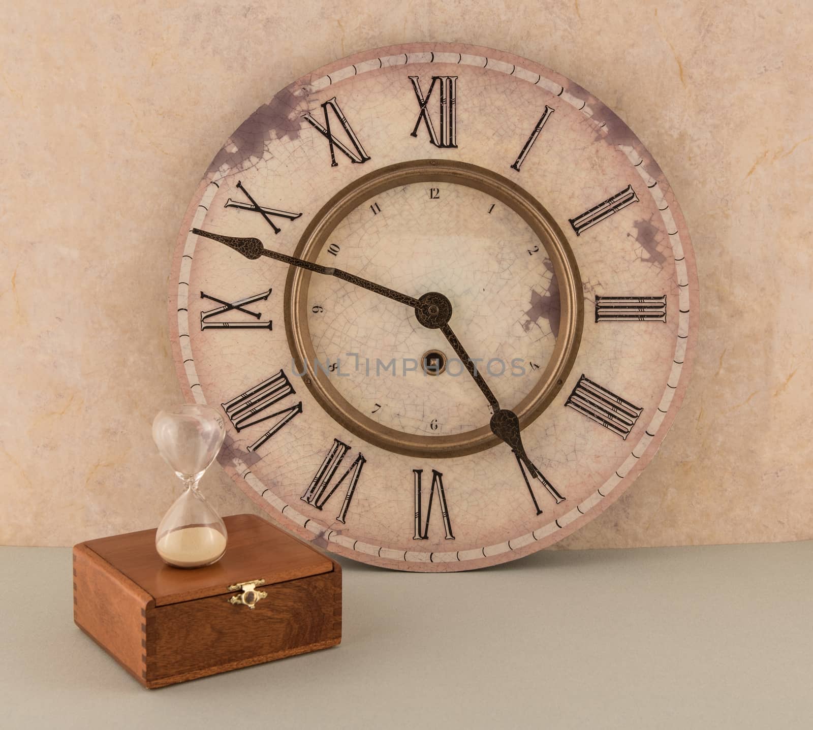Wall clock and hourglass scene