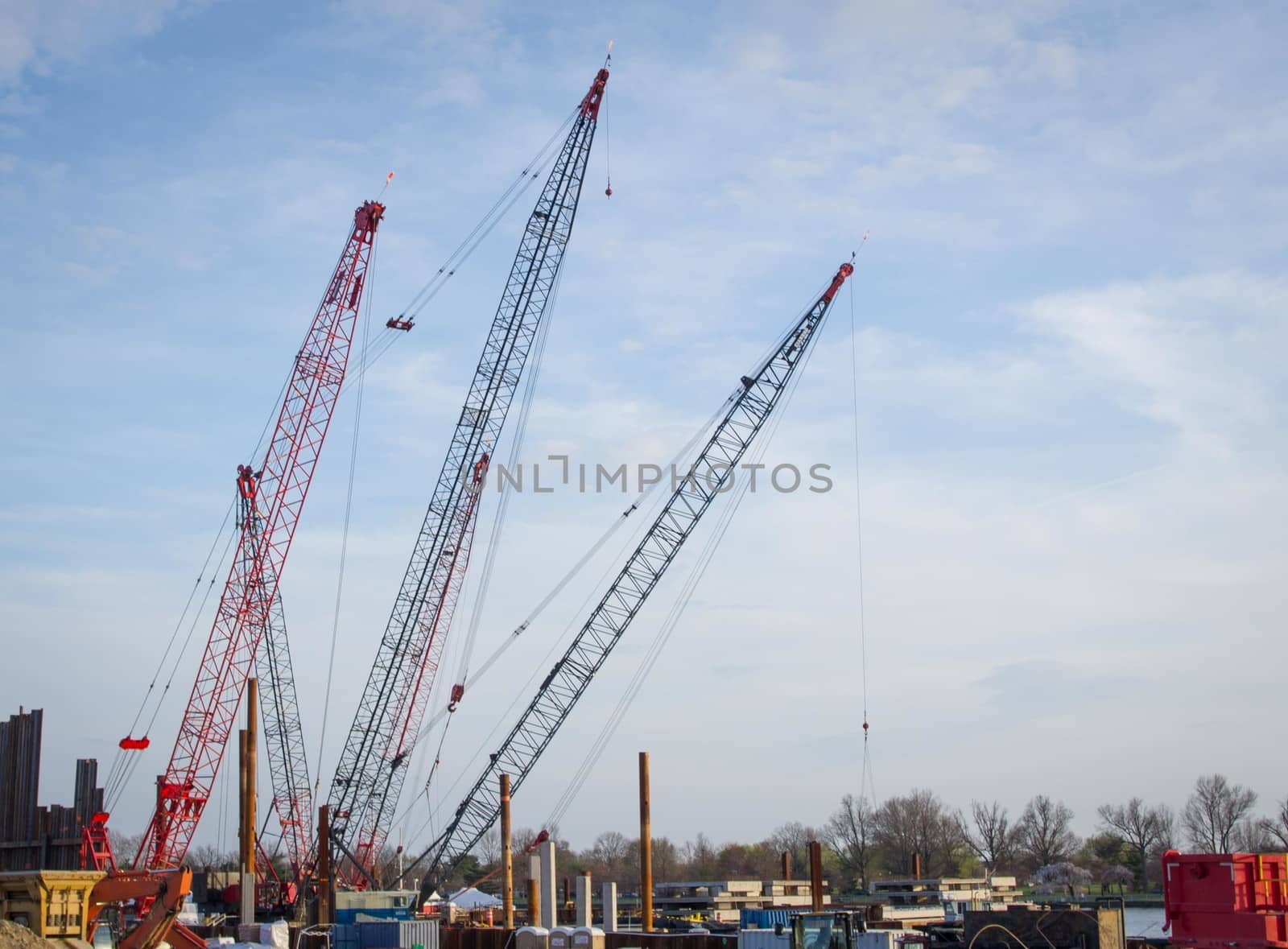 Cranes and Industrial Work Area by krisblackphotography