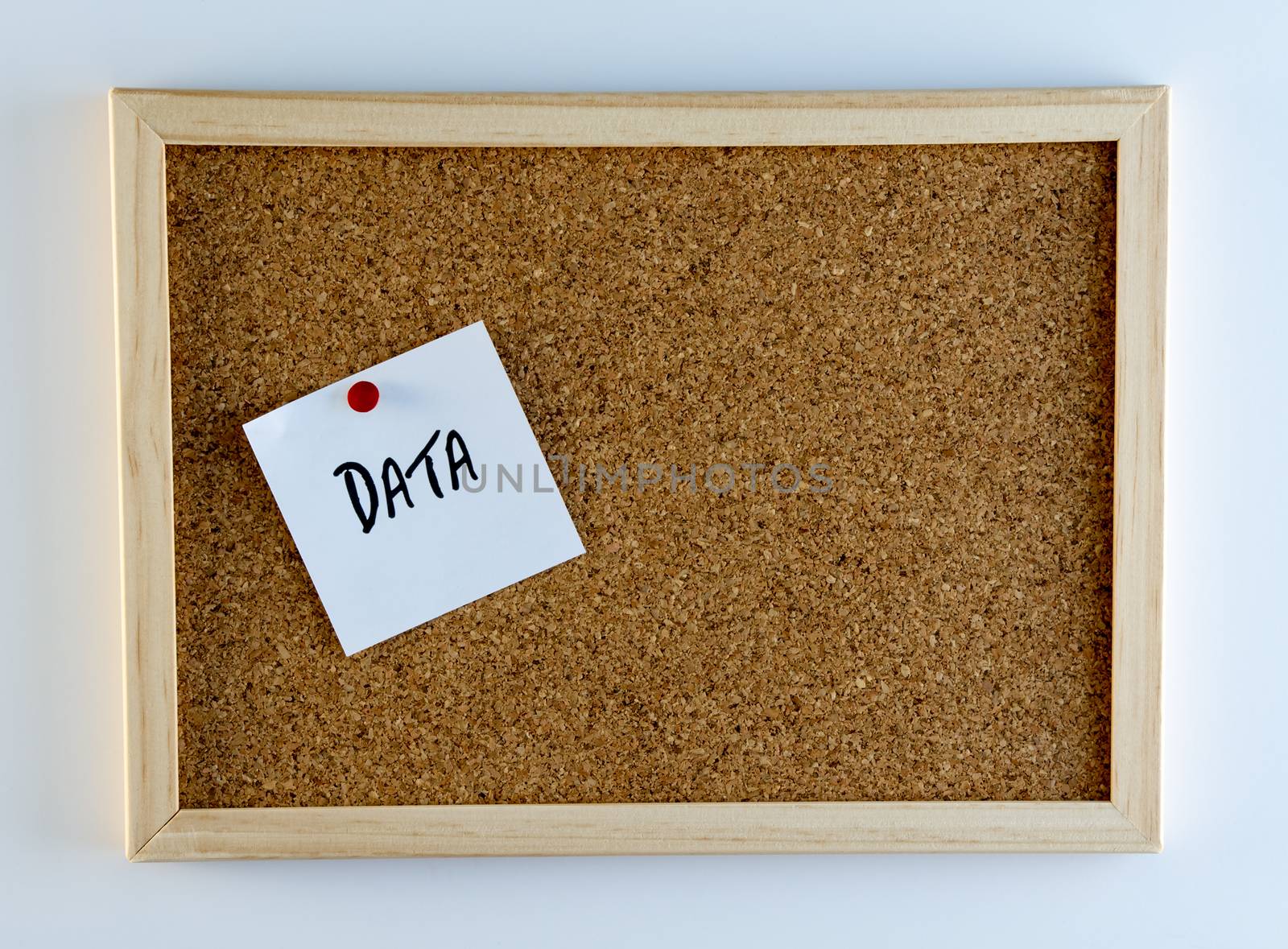 The word, "Data" pinned on cork bulletin board