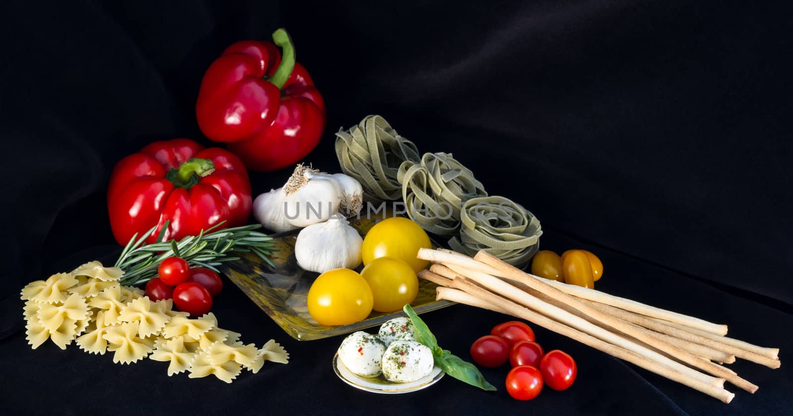 Fresh Italian ingredients still life on white background
