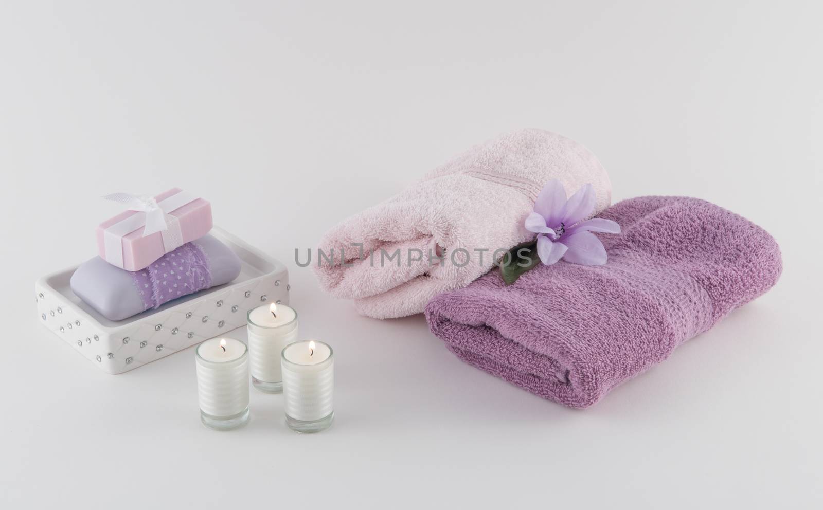 Luxury Bath Soap with Towels and Candles by krisblackphotography