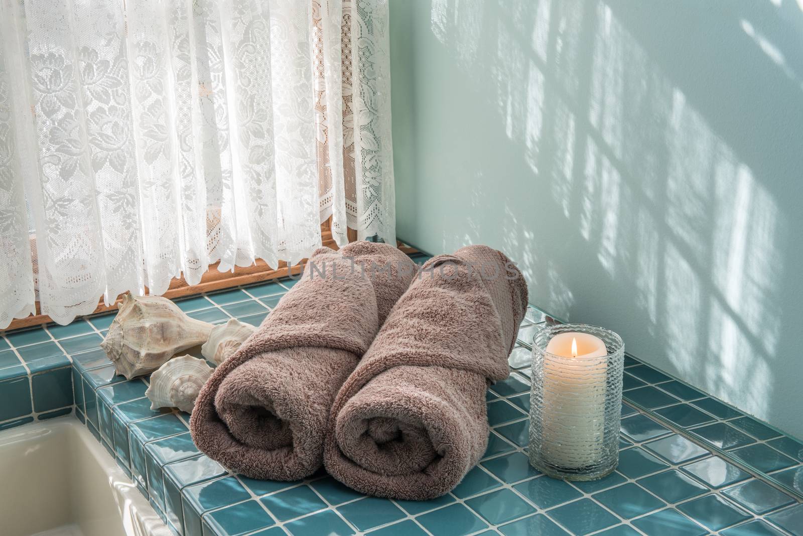 Master Bath Luxury Towels and Candle by krisblackphotography
