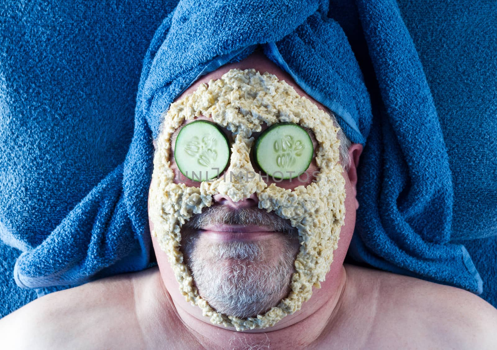 Man receiving facial at the spa