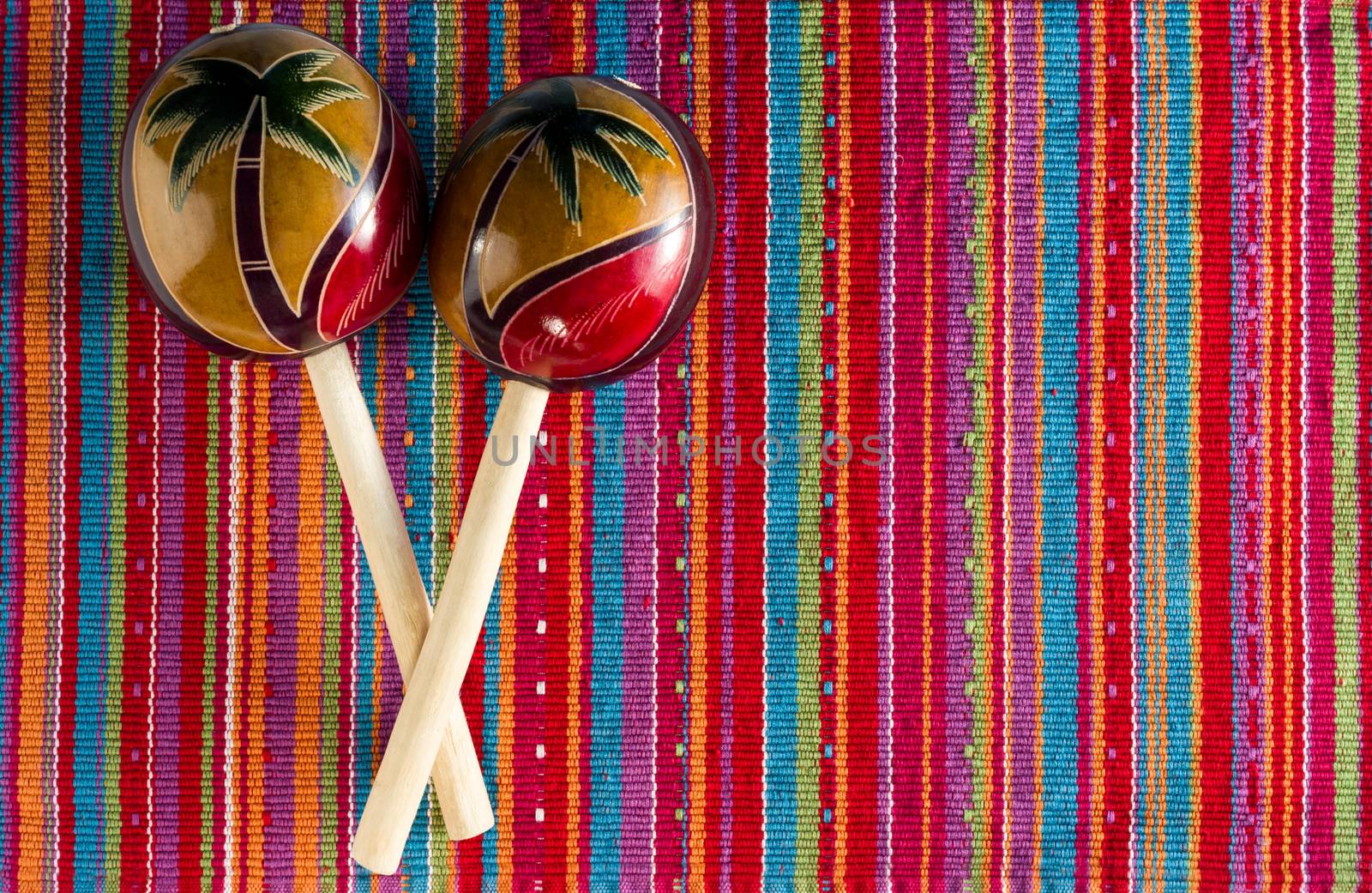 Pair of Maracas on Colorful Background by krisblackphotography