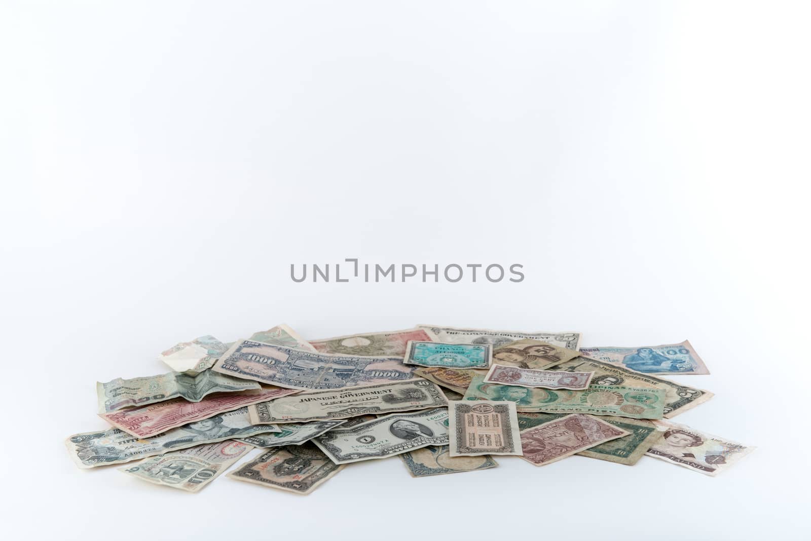 Pile of money on white background